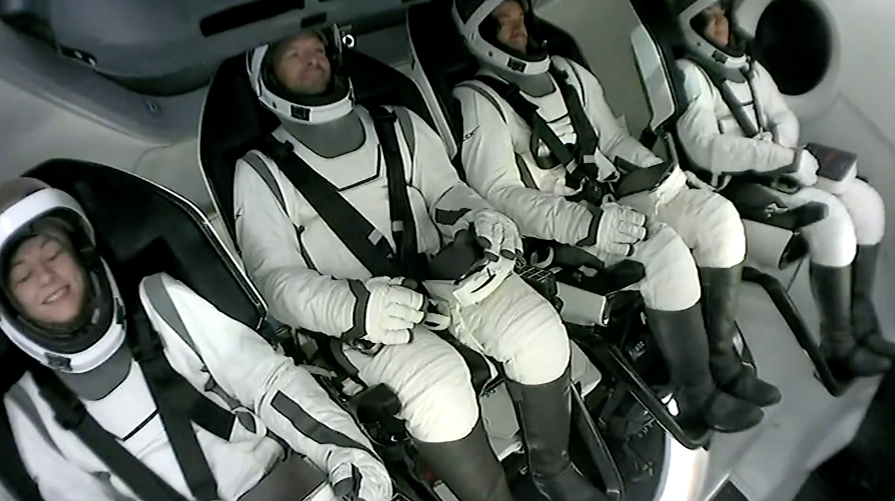 The Polaris Dawn crew sit, strapped into their Dragon capsule, wearing their spacesuits. More missions are planned, but it is unclear when they could happen.