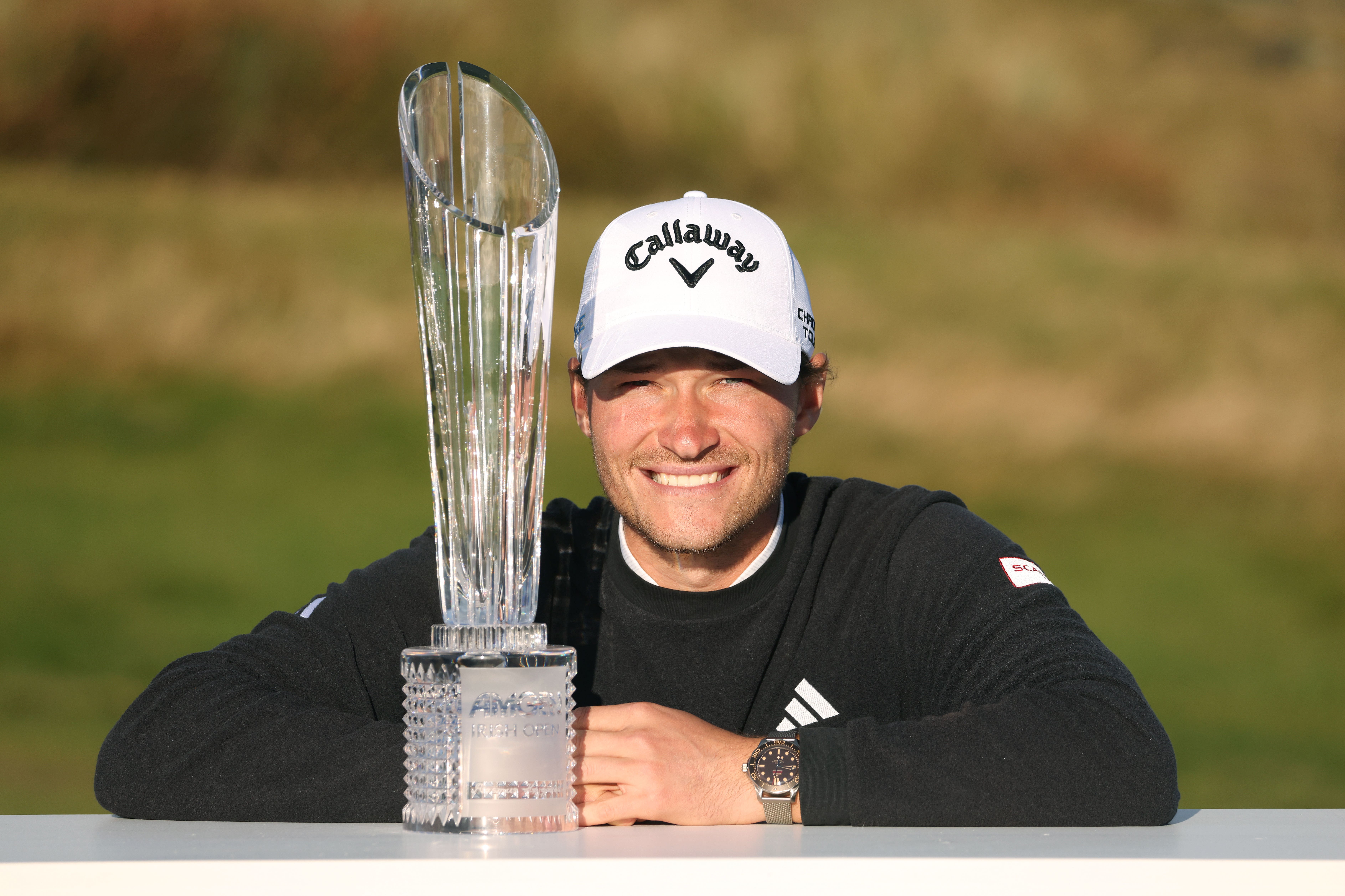 Denmark’s Rasmus Hojgaard poses with the Amgen Irish Open trophy