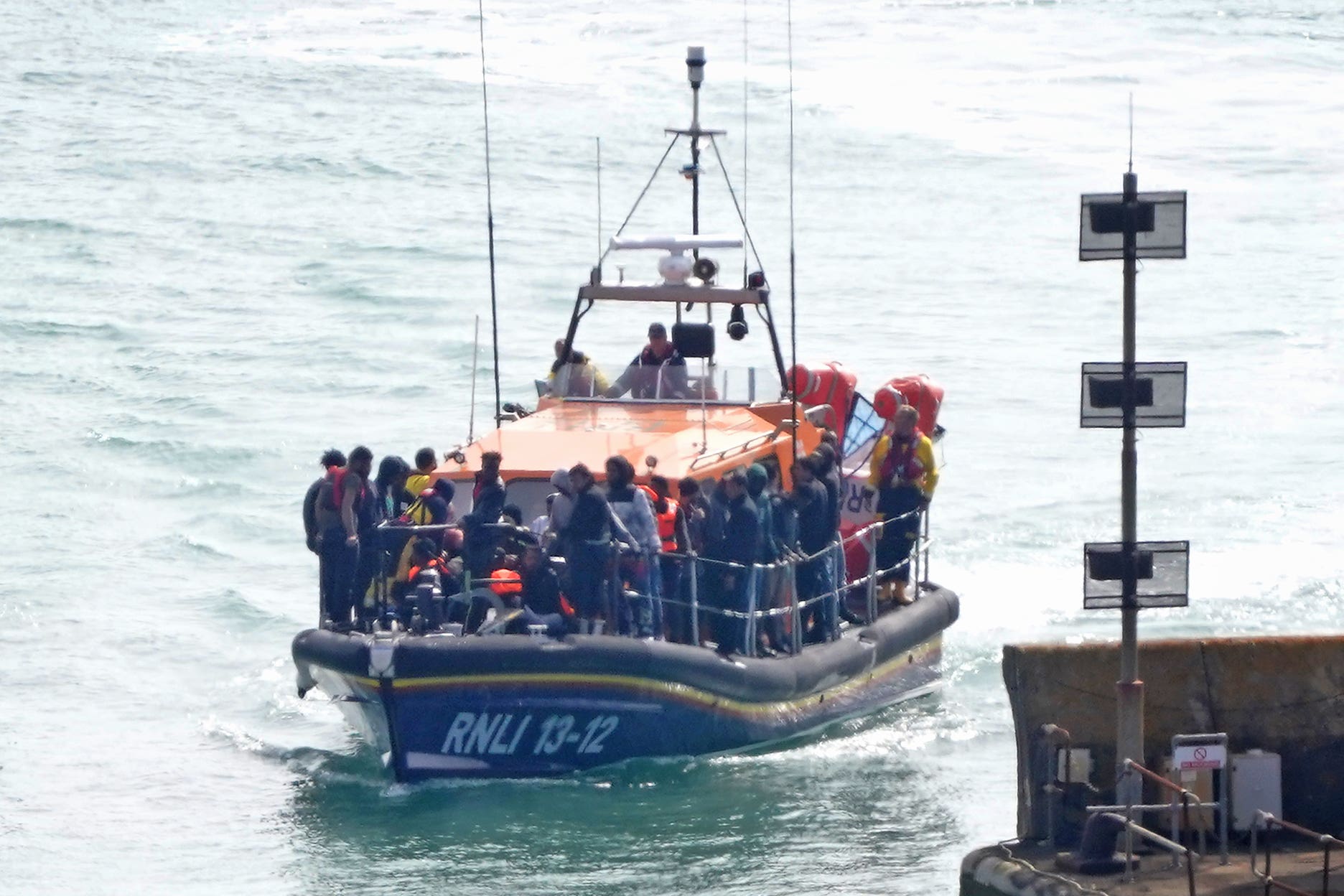 More than 1,000 people arrived in the UK after crossing the Channel over the weekend, as eight people died trying to make the journey