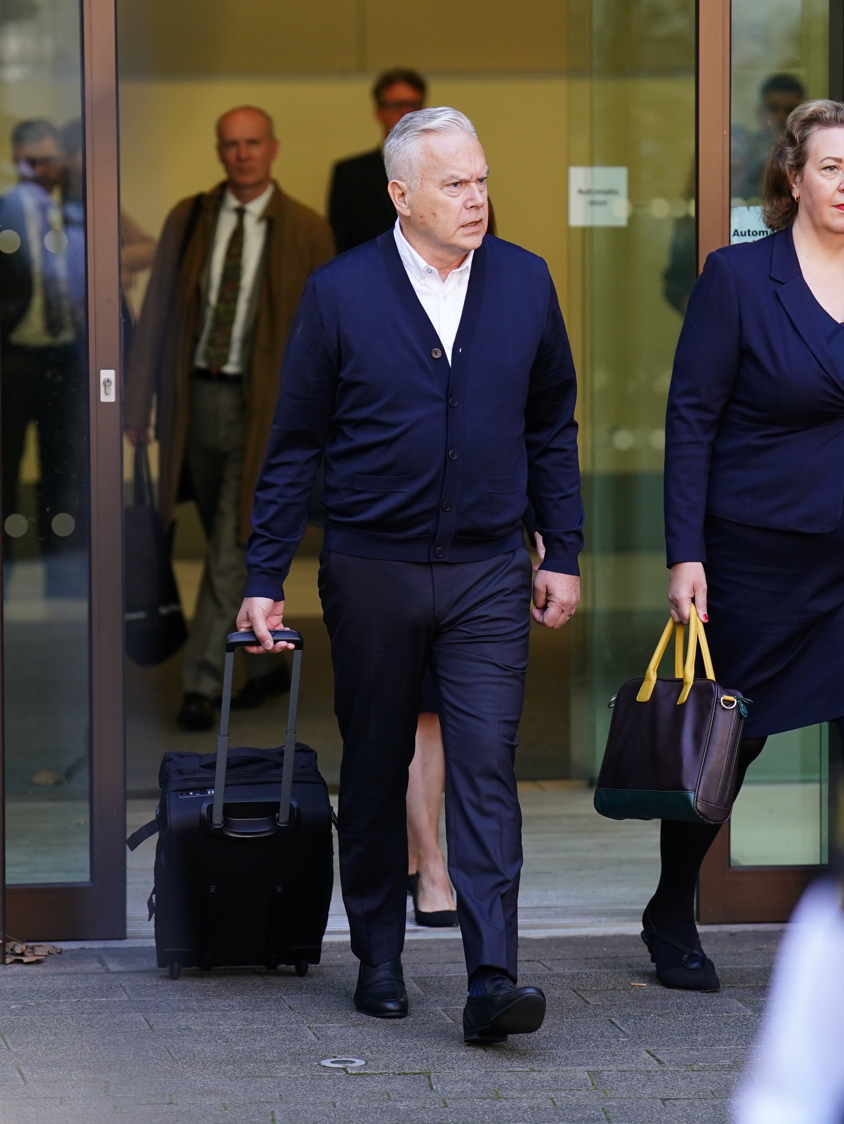 The former BBC broadcaster leaves Westminster Magistrates’ Court after being sentenced