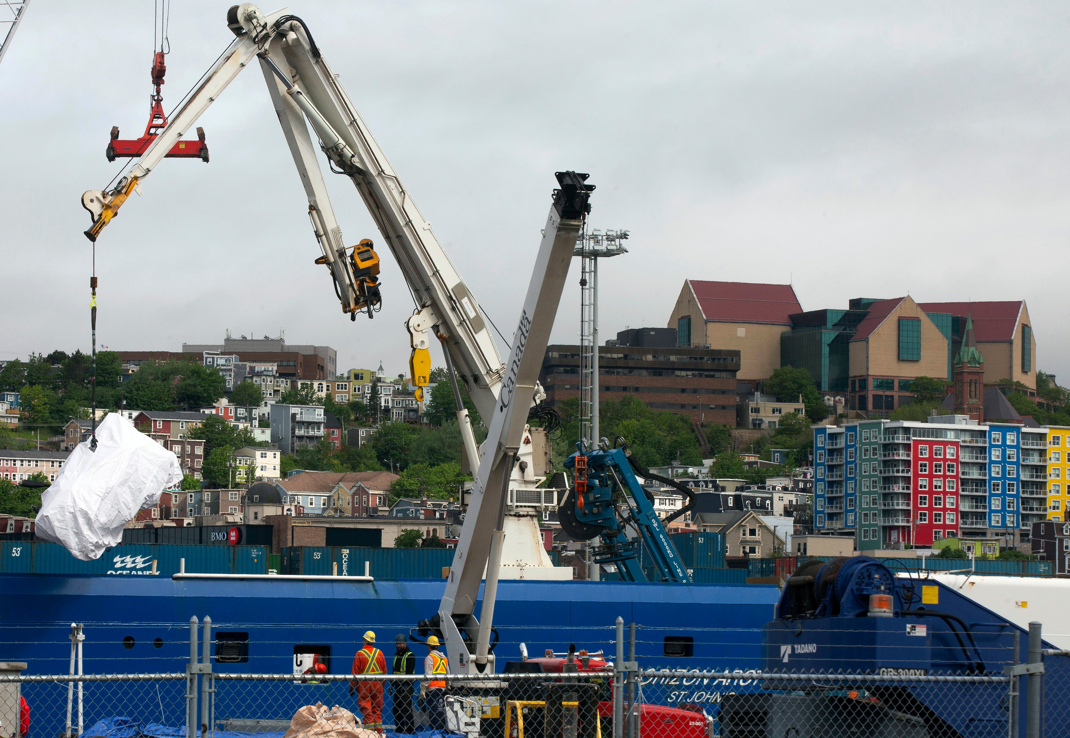 Debris from the Titan submersible, recovered from the ocean floor near the wreck of the Titanic, is unloaded from the ship Horizon Arctic at the Canadian Coast Guard pier in St. John's, Newfoundland, June 28, 2023.