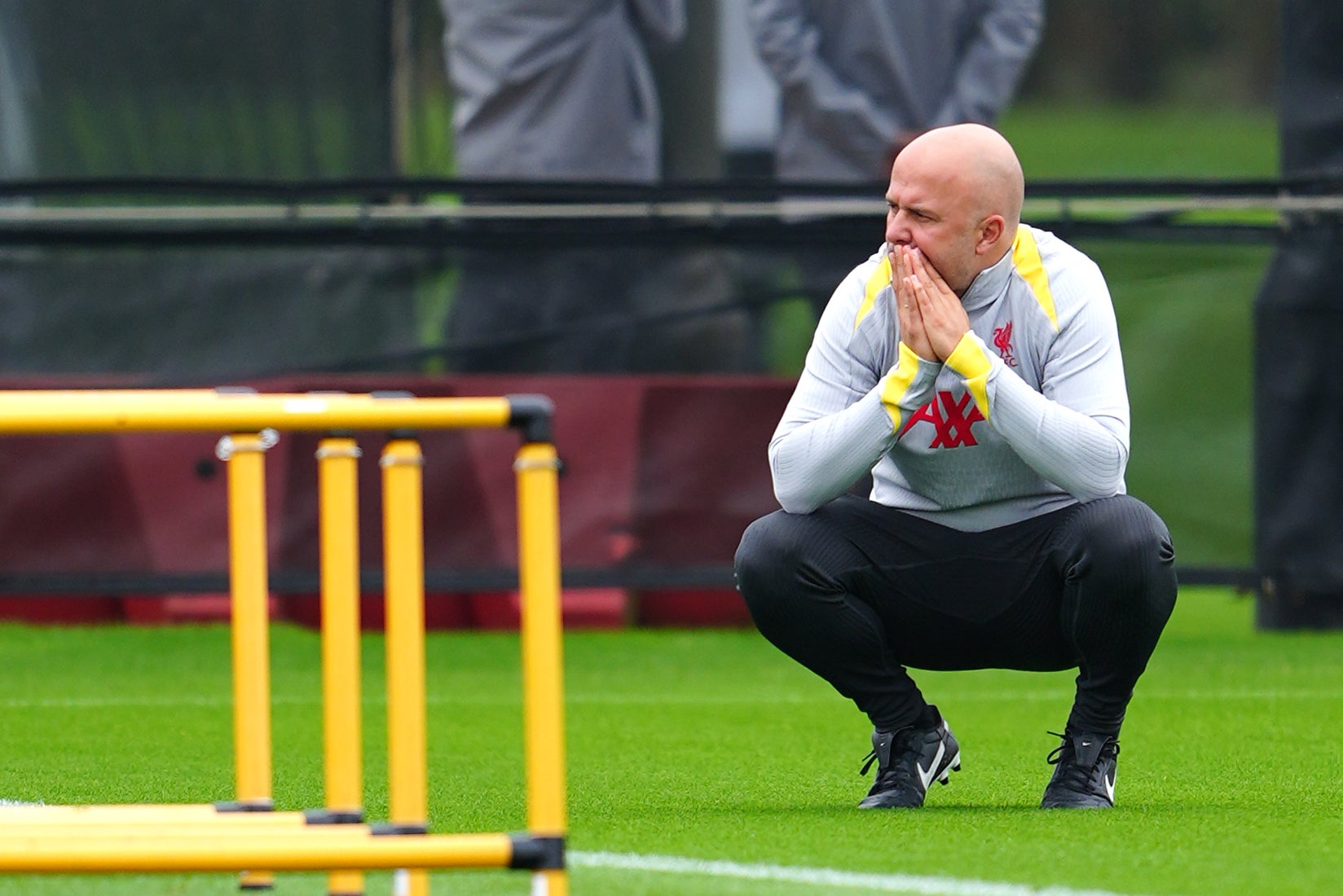 Liverpool manager Arne Slot watches on during a training session