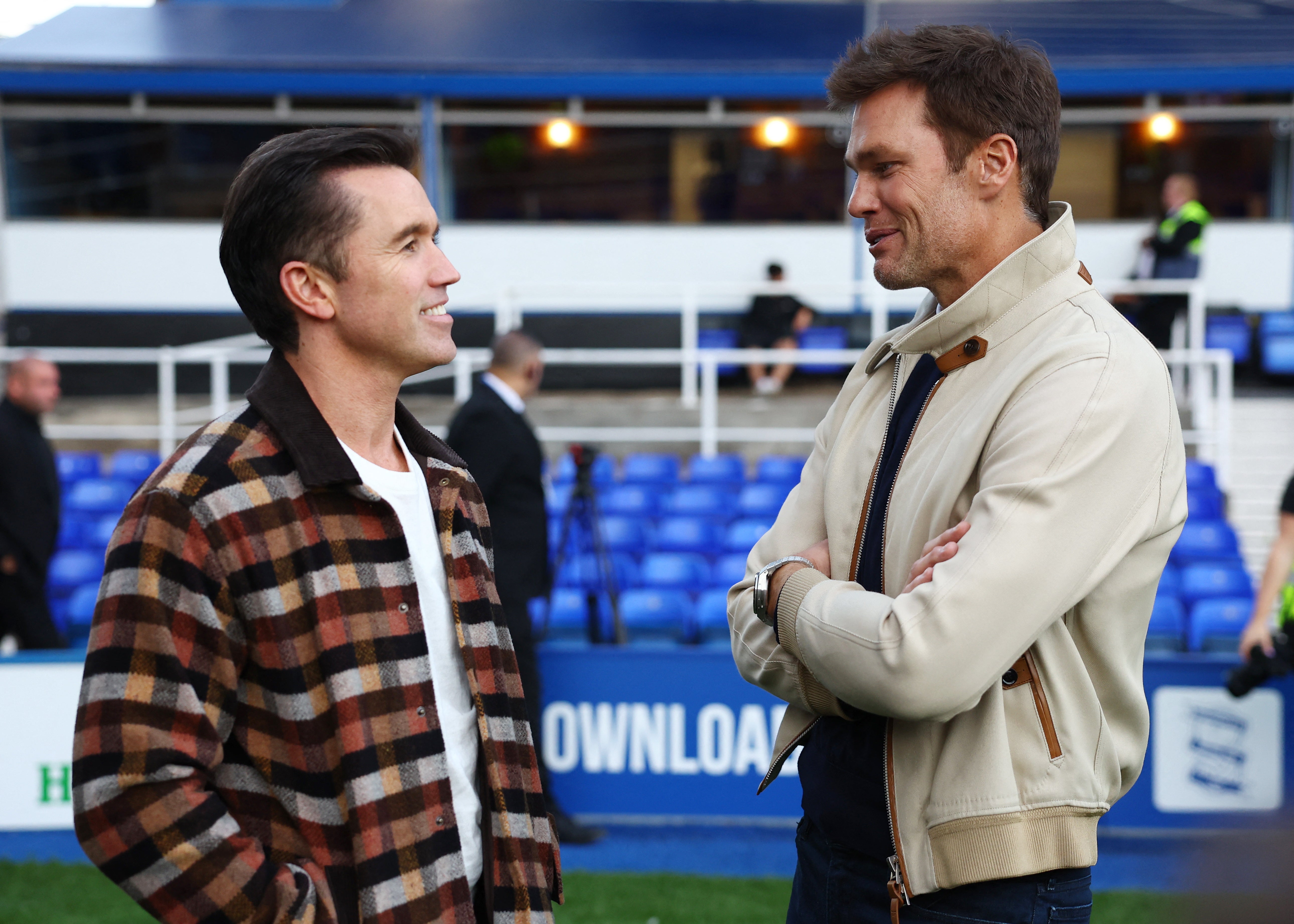 Rob McElhenney and Tom Brady speak before kick-off