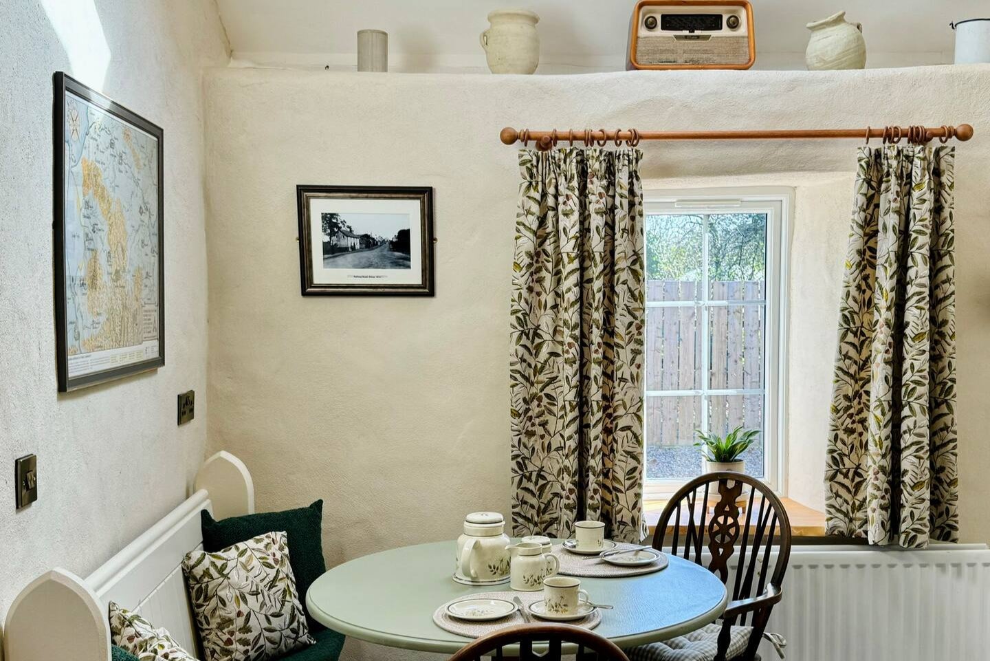 This dainty 200-year-old cottage is decorated with William Morris designs