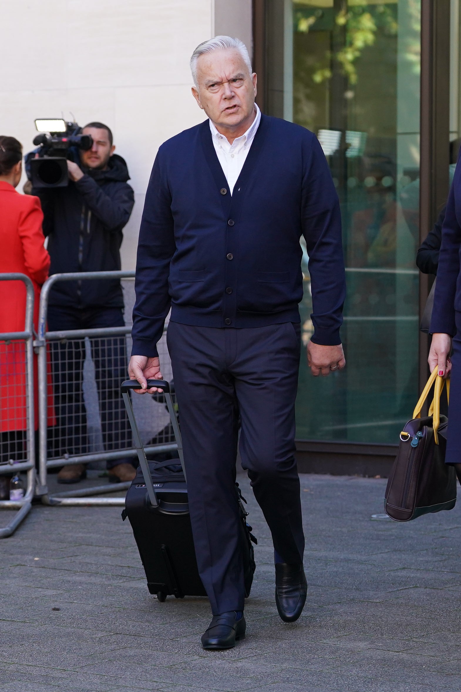 Huw Edwards leaves Westminster Magistrates’ Court in London after being sentenced to six months’ imprisonment suspended for two years