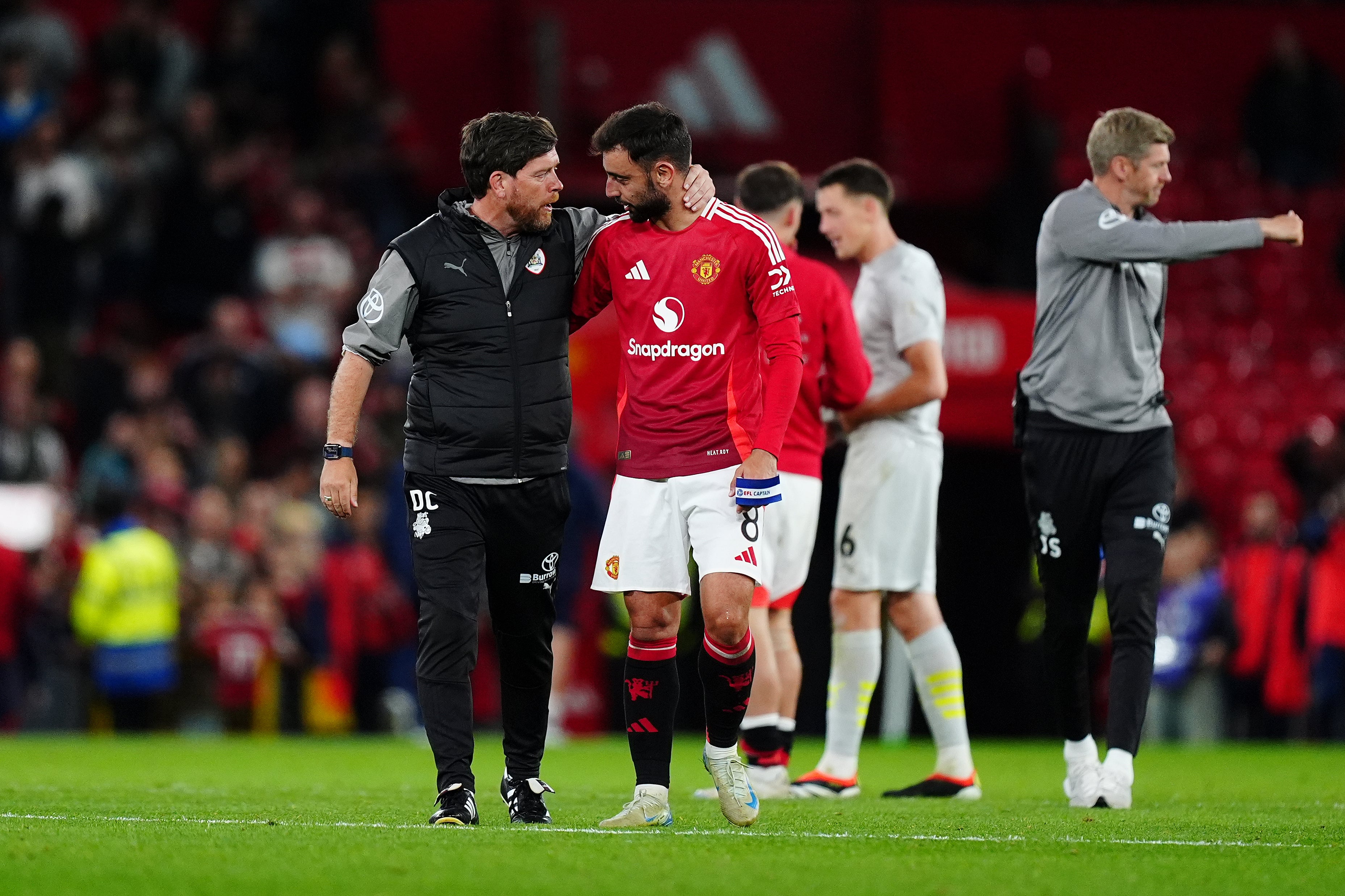 Barnsley manager Darrell Clarke, left, was a boyhood Manchester United fan (Mike Egerton/PA)