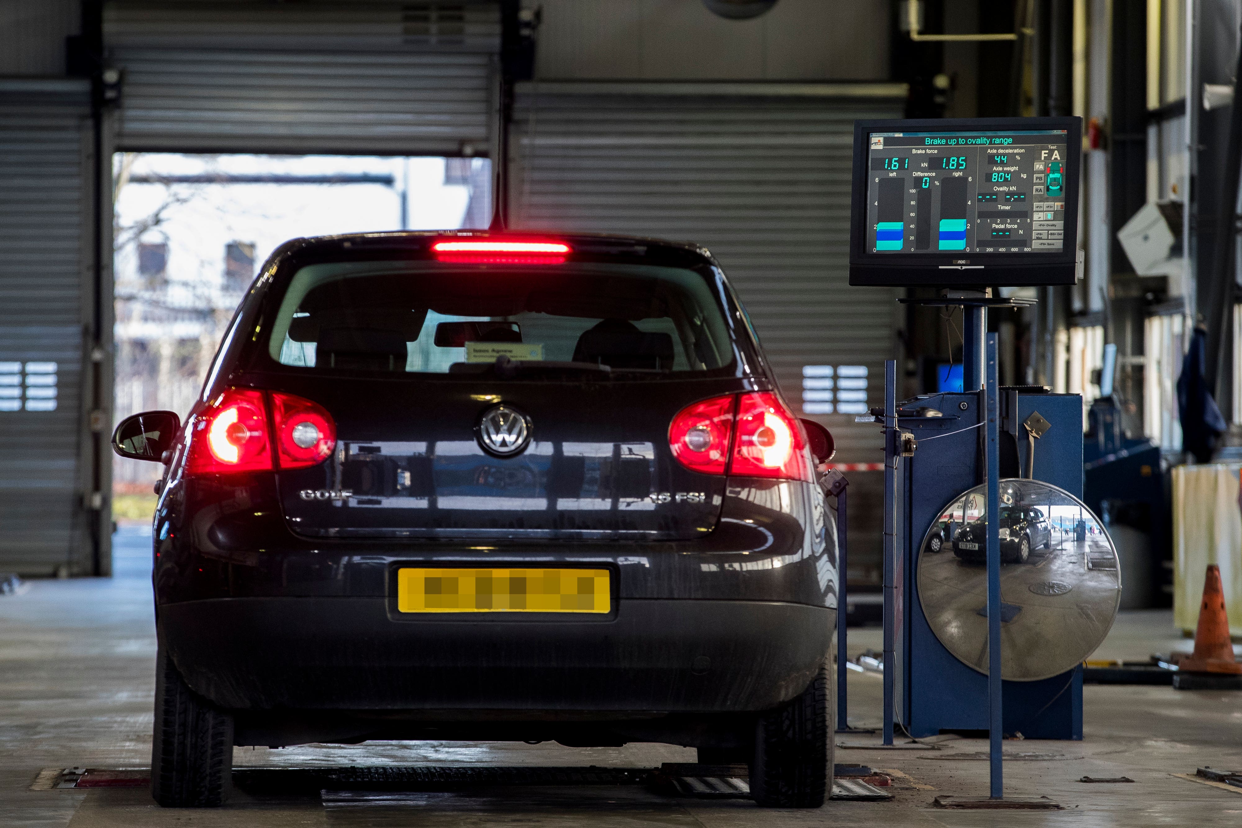 MOTs check a number of vehicle parts such as lights, seatbelts, tyres and brakes to ensure they meet legal standards (Liam McBurney/PA)