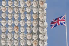 Faces of transgender people adorn an artwork in London's Trafalgar Square