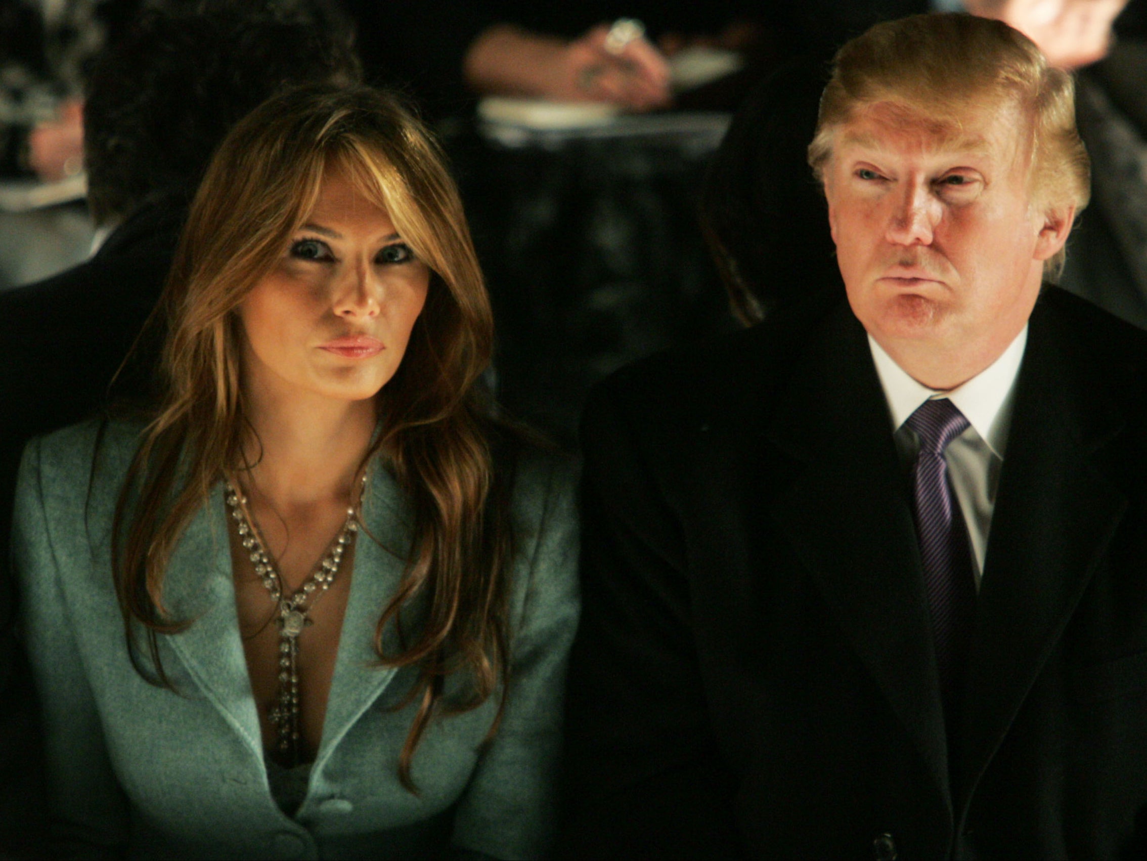 Melania and Donald Trump attend the Michael Kors fall fashion show in New York City on February 9 2005