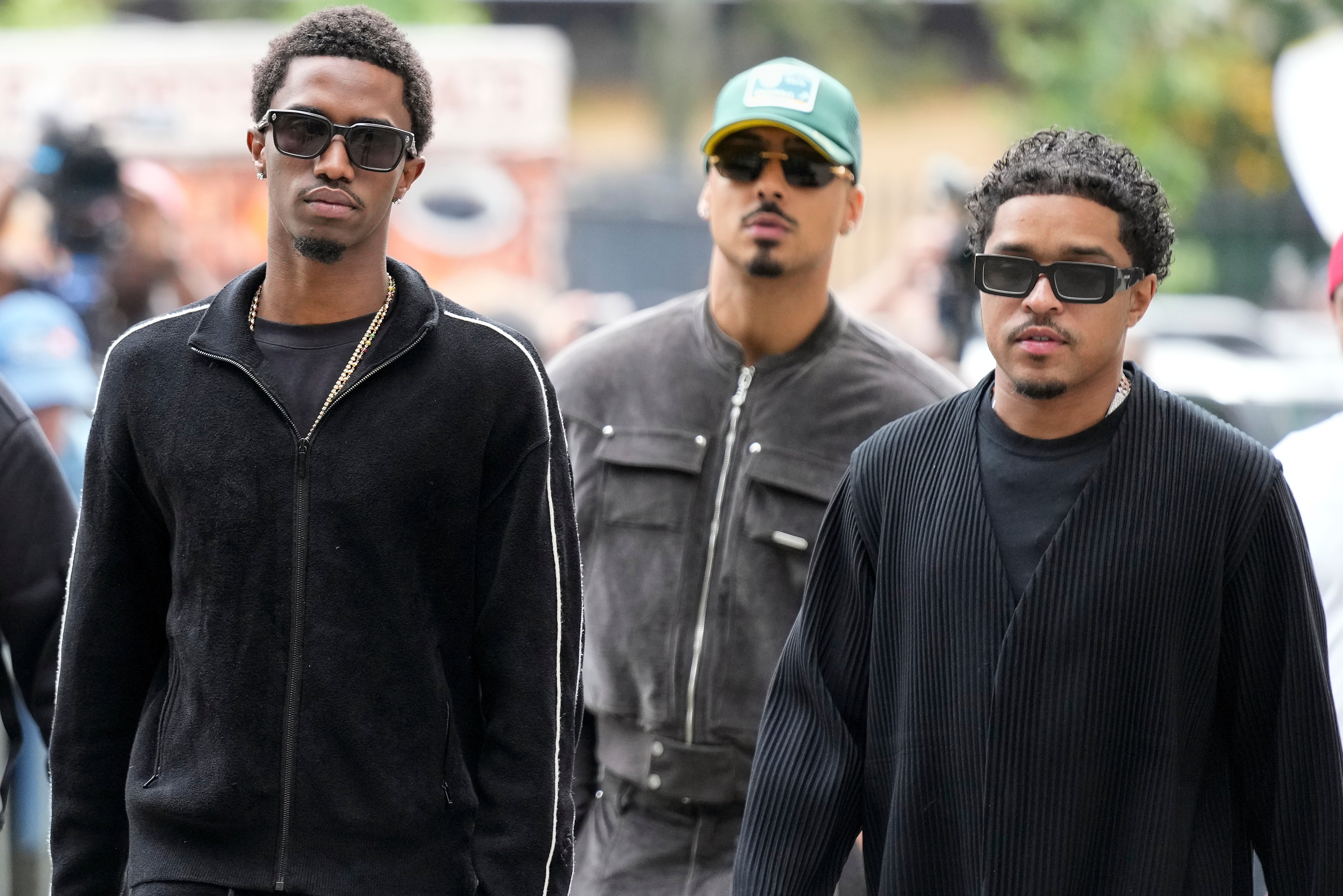 King Combs, Quincy Brown and Justin Dior Combs (from left to right) at federal court for their father’s bail hearing on September 17 in New York