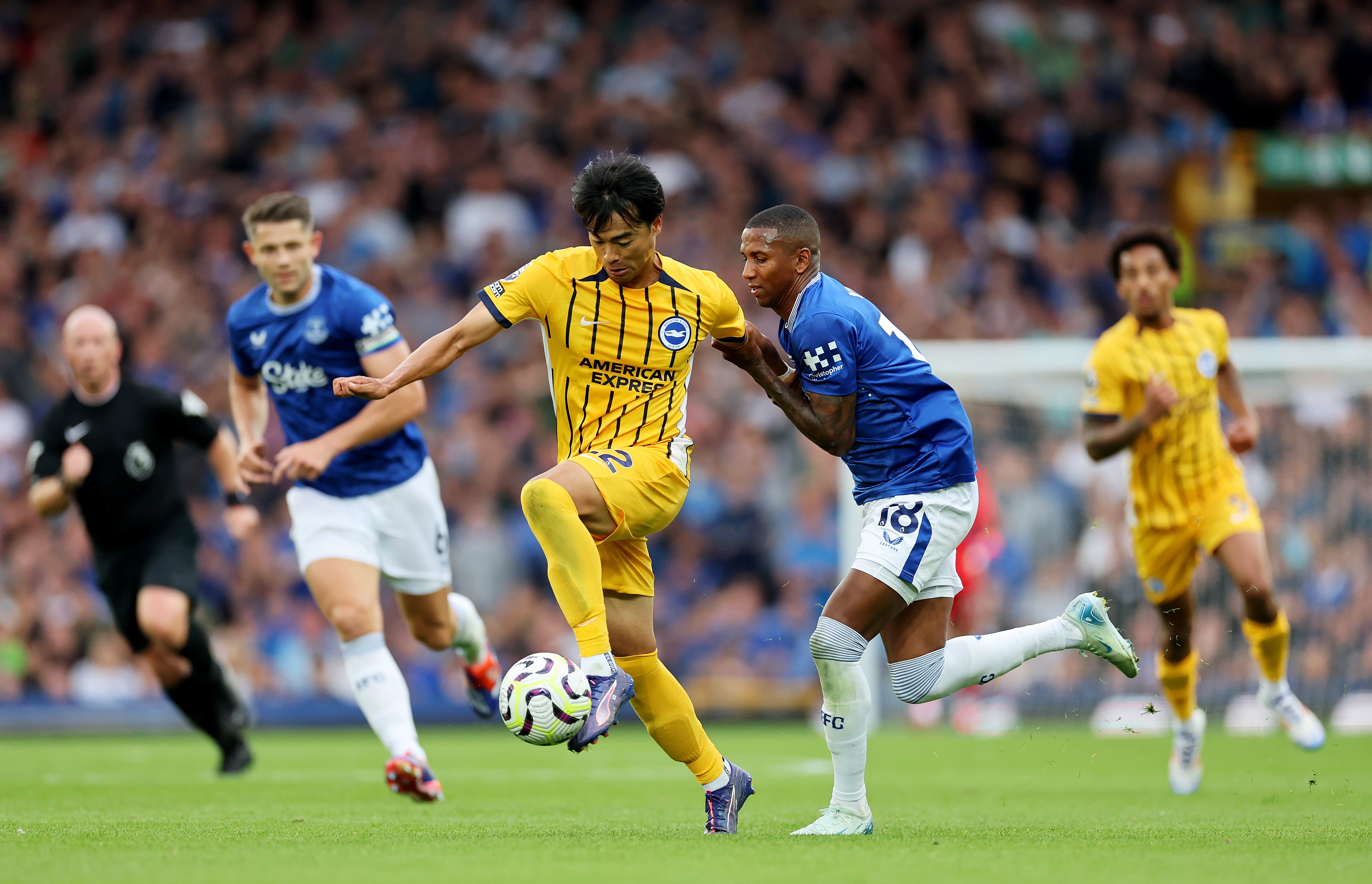 Ashley Young pulls back Kaoru Mitoma to earn a red card against Brighton