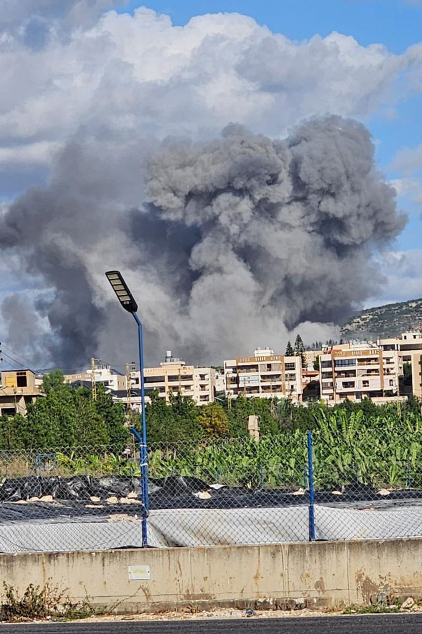 Smoke rises after an Israeli airstrike hit the Tyre, in southern Lebanon