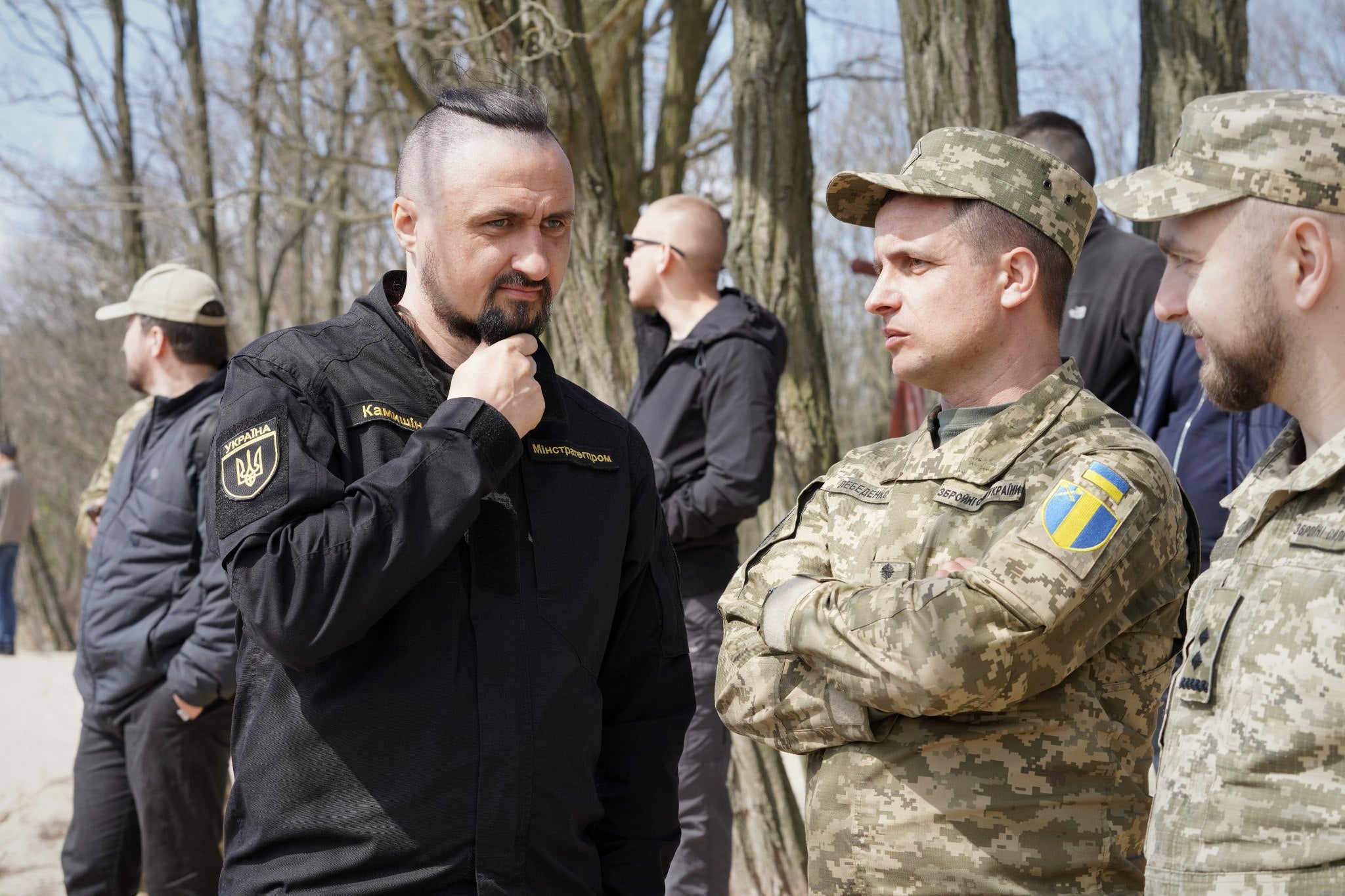 Oleksandr Kamyshin, left, with frontline Ukrainian soldiers earlier this year