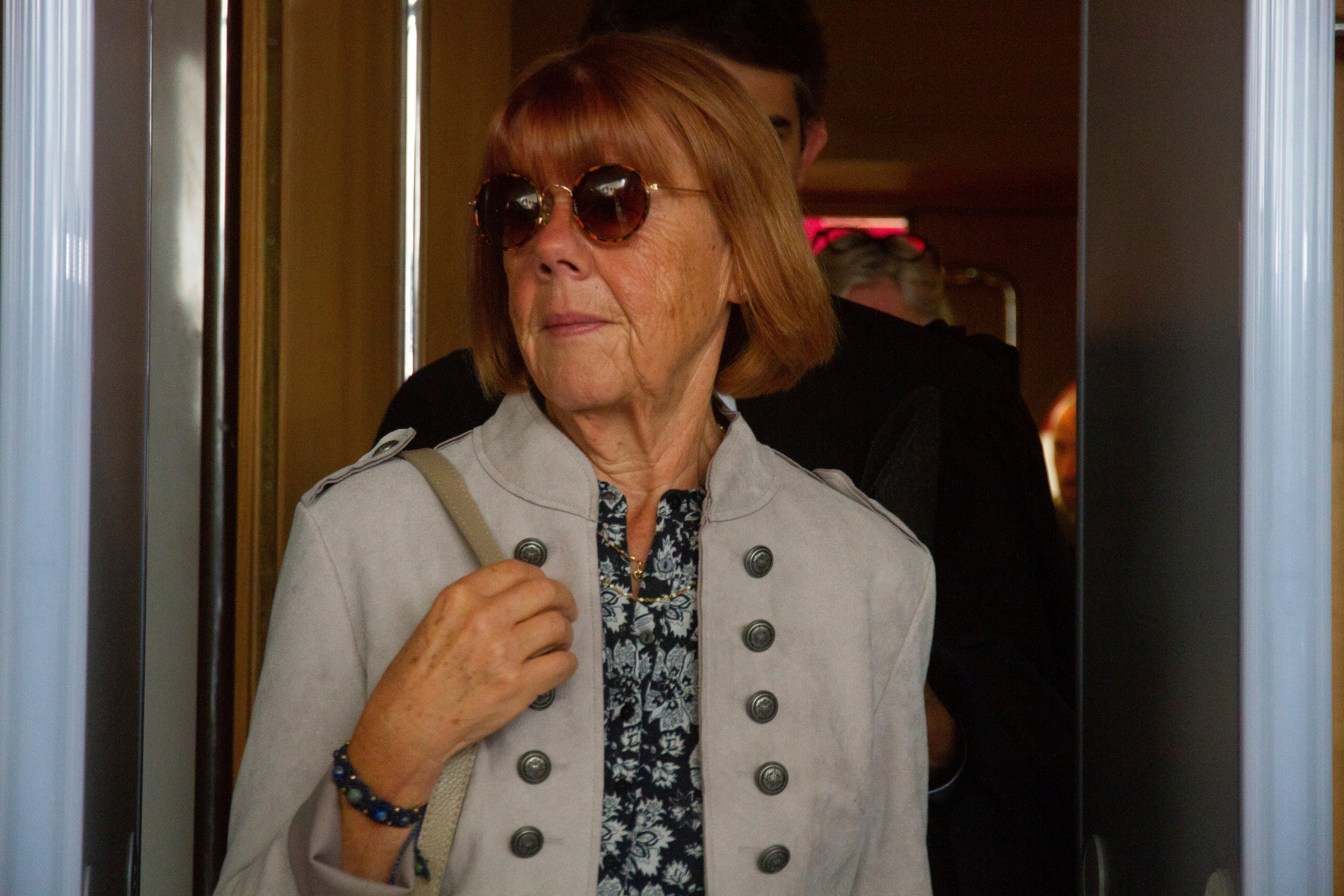 Gisele Pelicot exits the Avignon court house, in Avignon, southern France, Tuesday, Sept. 17, 2024, after her ex-husband admitted in court that for nearly a decade, he repeatedly drugged his unwitting wife and invited dozens of men to rape her while she lay unconscious. (AP Photo/Diane Jantet)