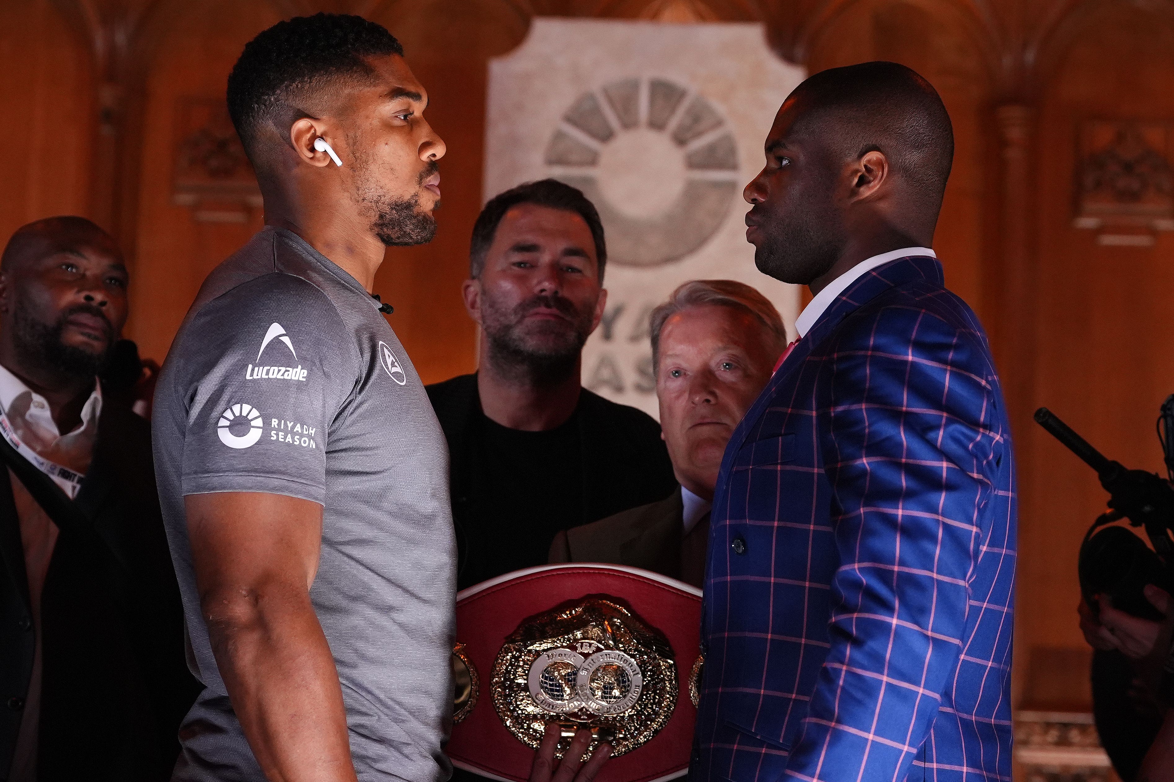 Anthony Joshua (left) and Daniel Dubois face off (Bradley Collyer/PA)