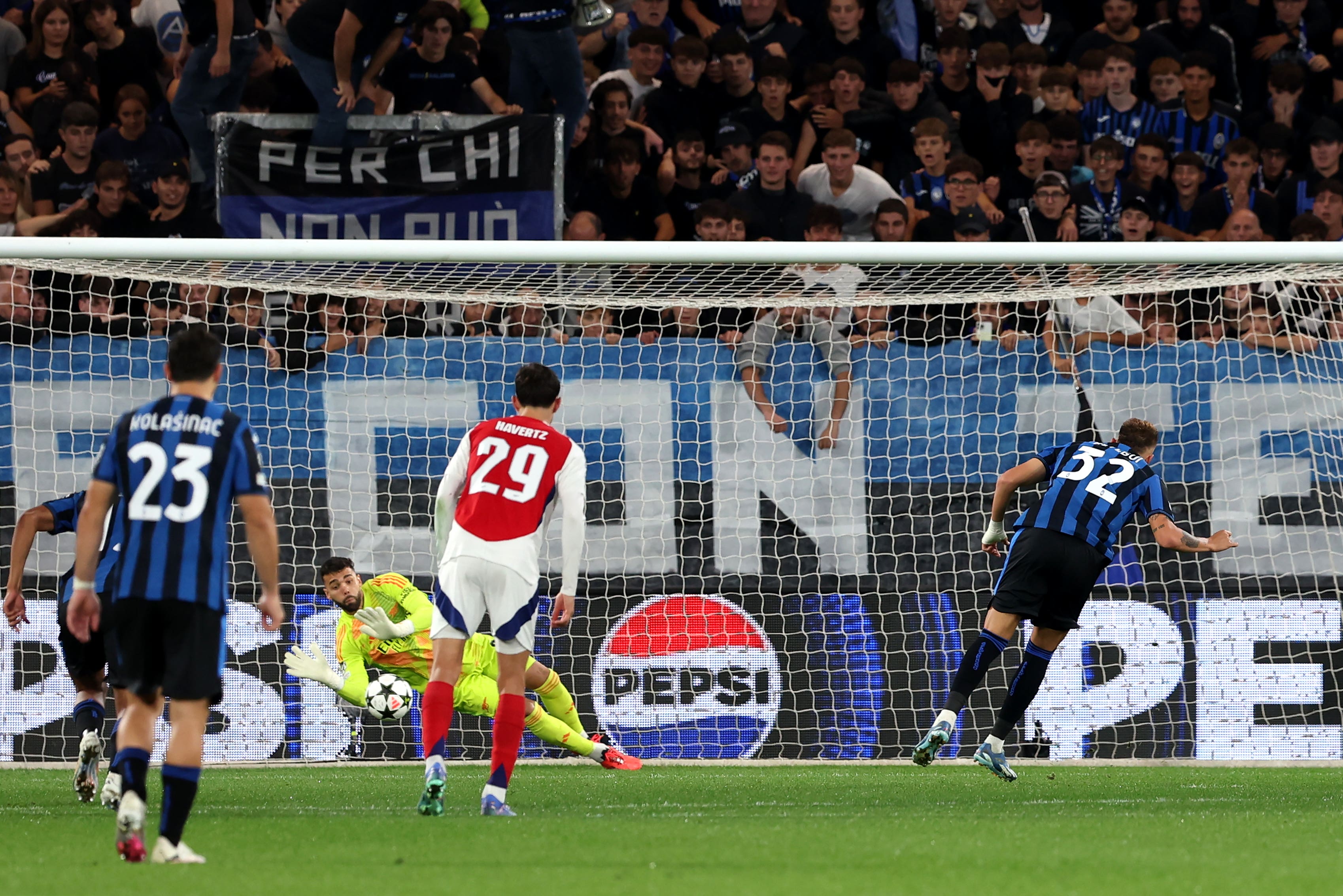 Raya first saved Retegui’s penalty down low to his right