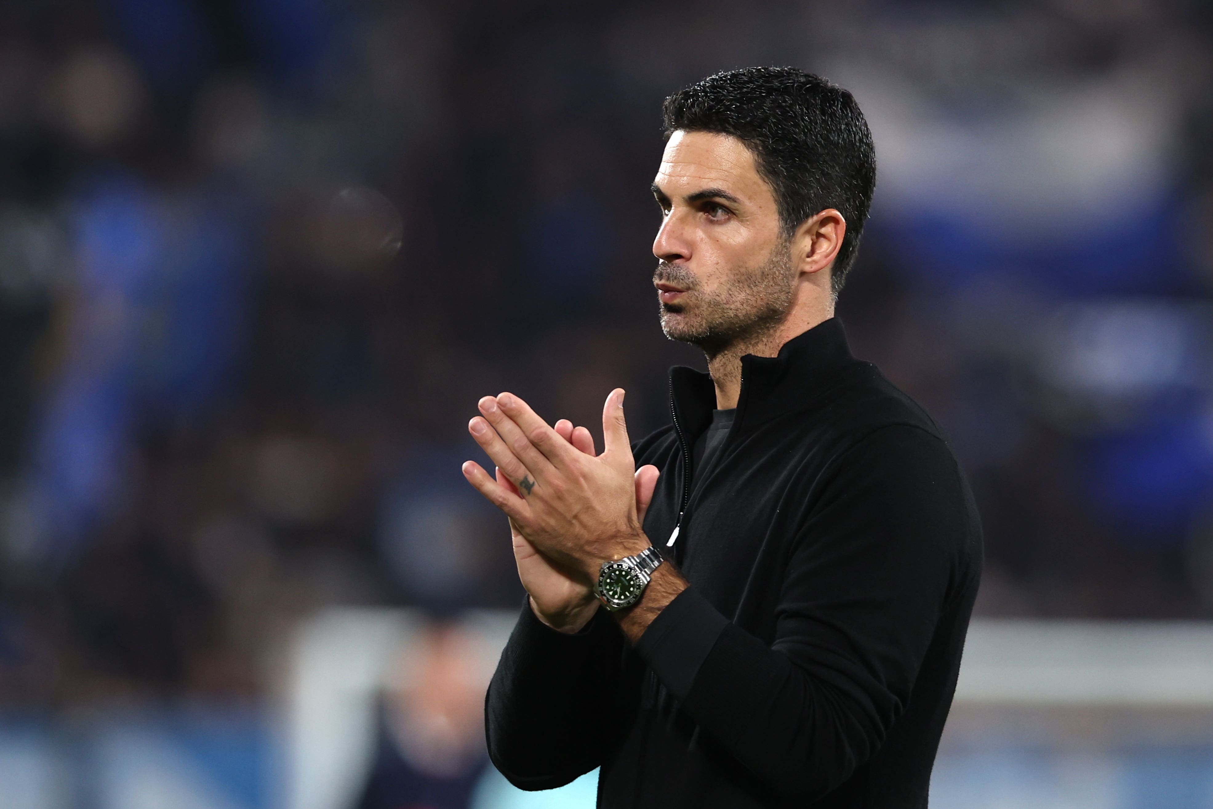 Mikel Arteta applauds his team after drawing with Atalanta