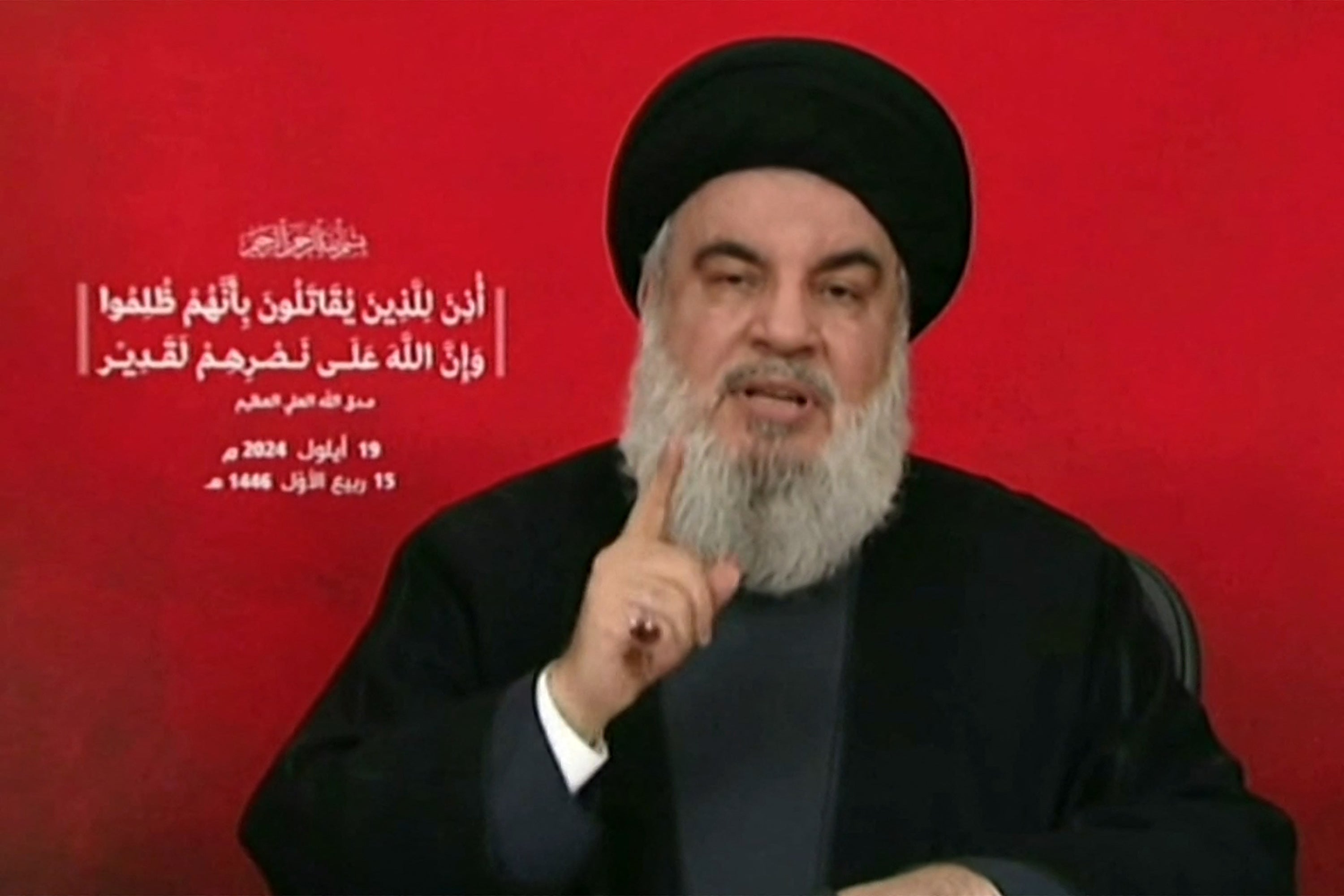 An image grab taken from Hezbollah’s Al-Manar TV shows the Lebanese militant group’s chief Hassan Nasrallah addressing the nation from an undisclosed location on 19 September 2024