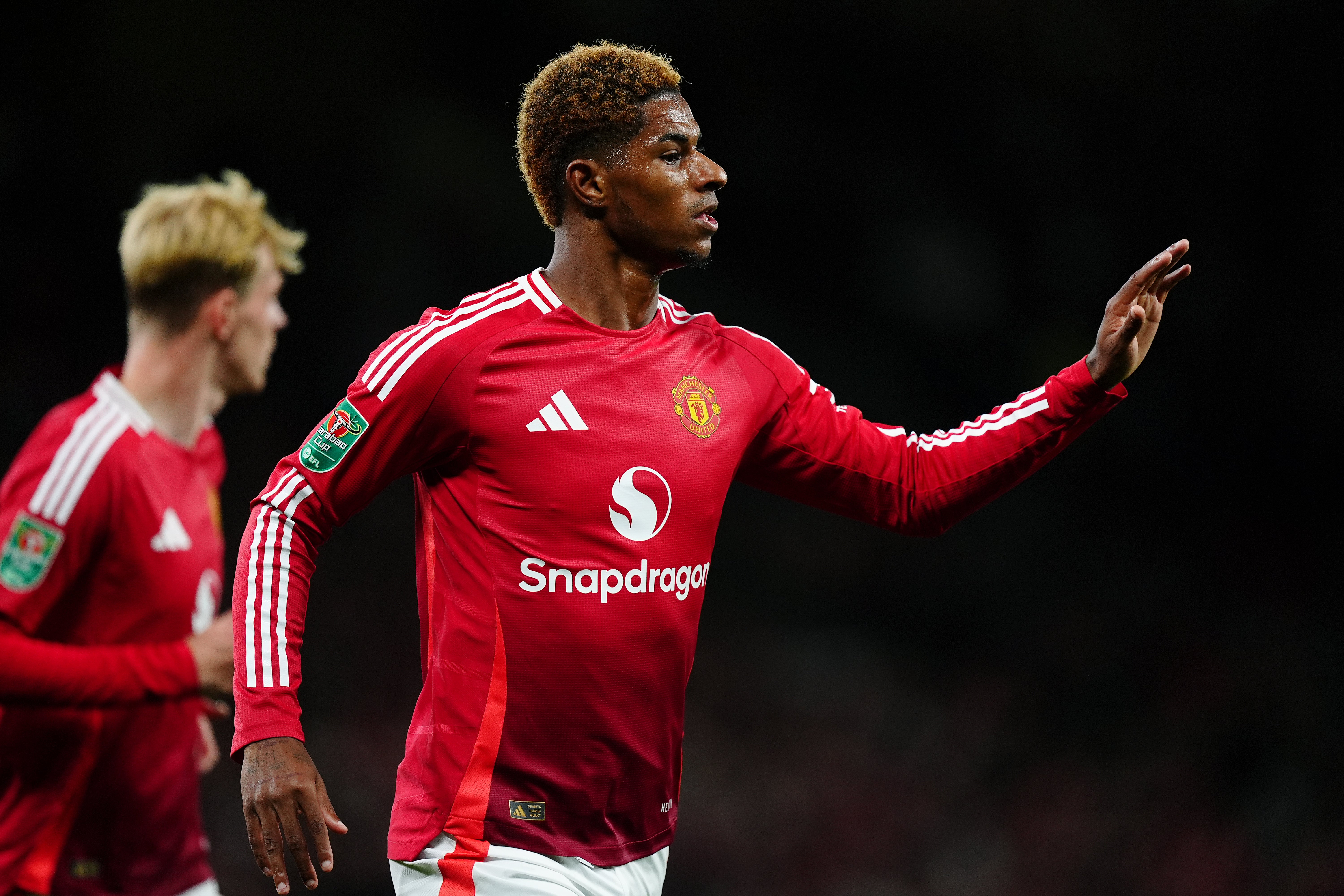 Marcus Rashford celebrates after opening the scoring against Barnsley (Mike Egerton/PA)