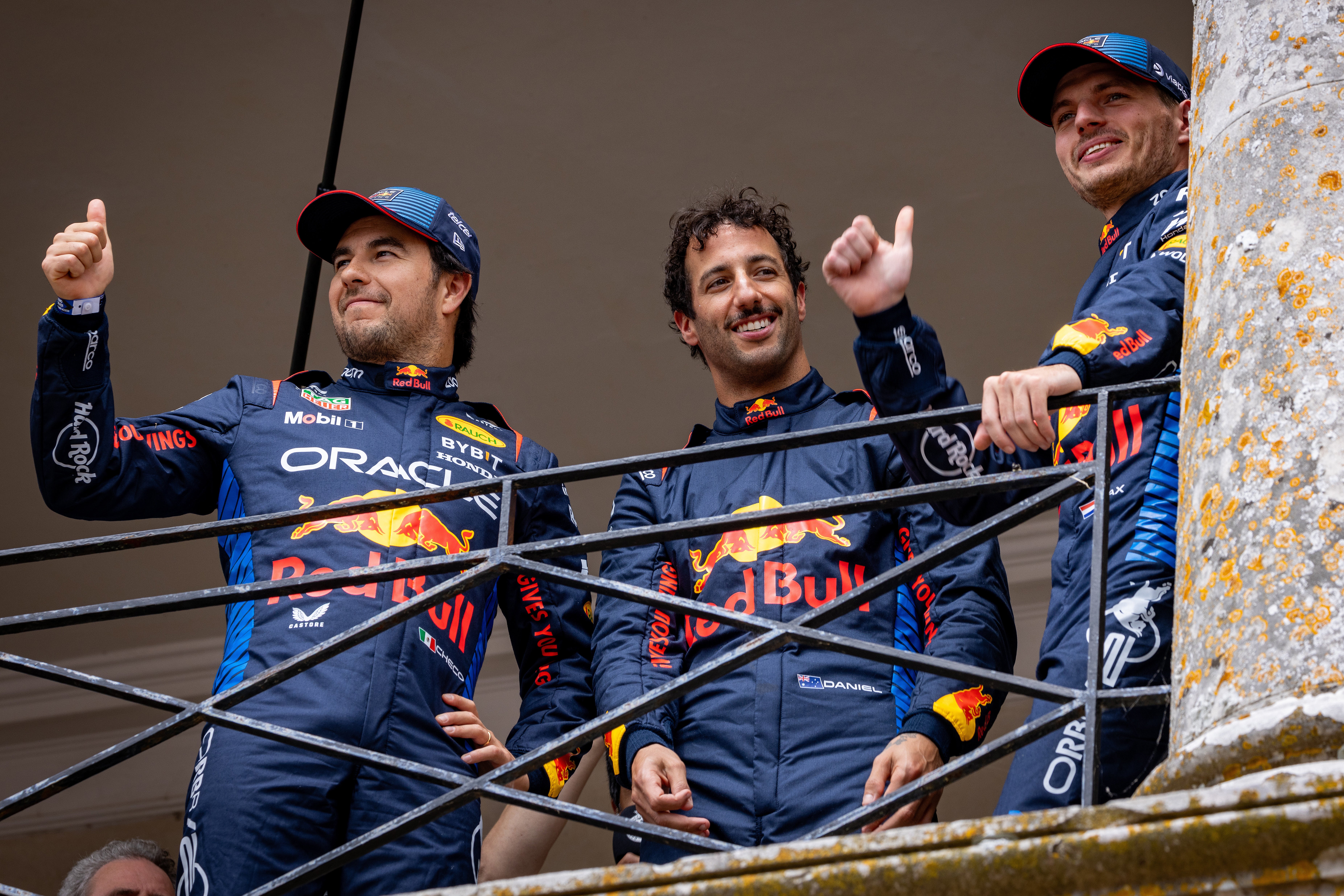 Ricciardo had eyed a spot at Red Bull, but Sergio Perez (left) has retained his seat