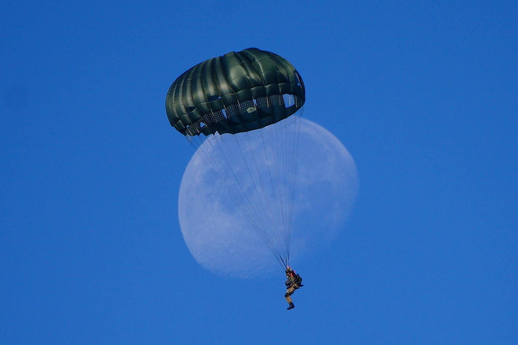 Paratroopers from Nato member countries jump on to Ginkel Heath in Ede, Netherlands, to commemorate the 80th anniversary of the Battle of Arnhem (Ben Birchall/PA)