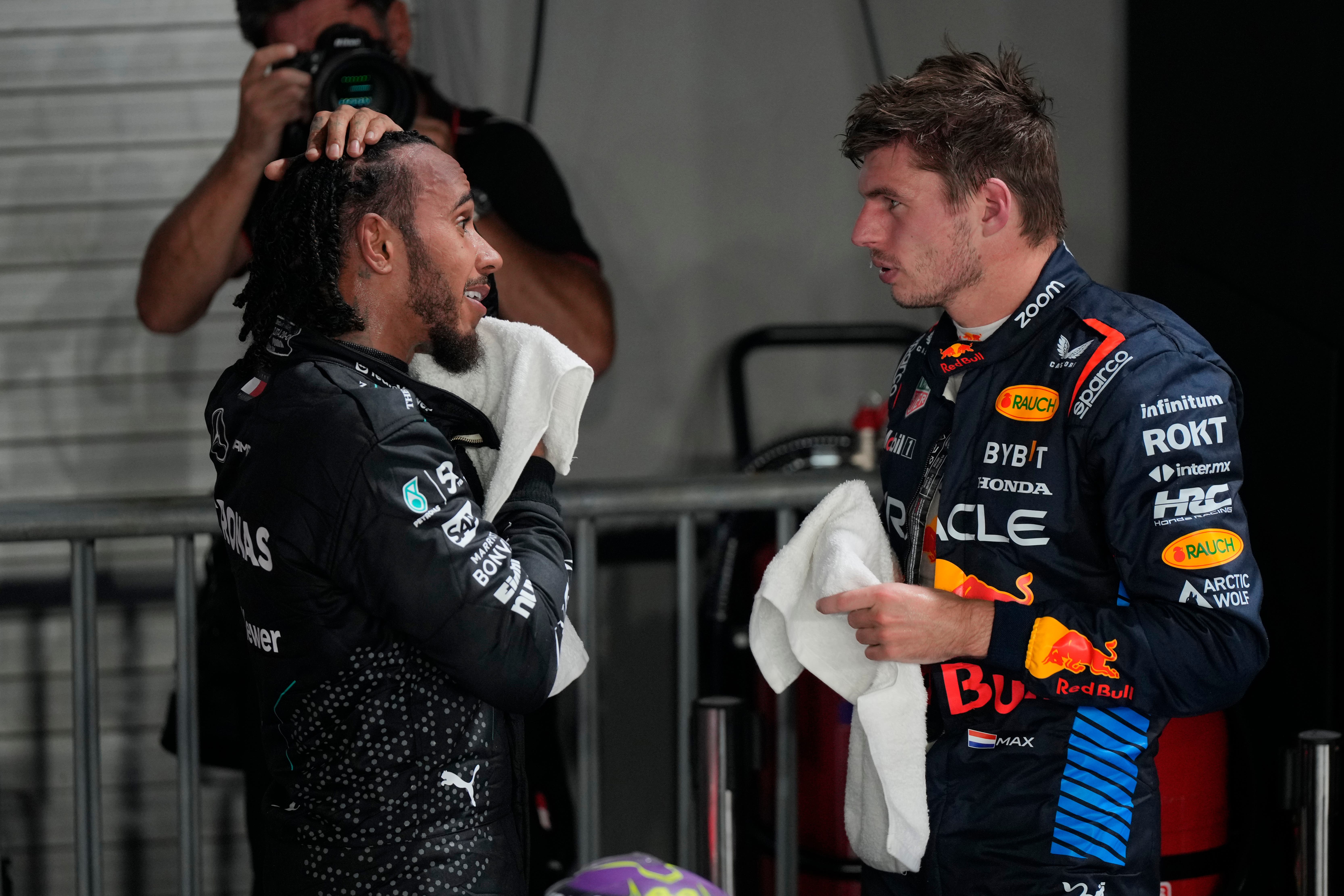 Lewis Hamilton has defended Max Verstappen (Vincent Thian/AP)