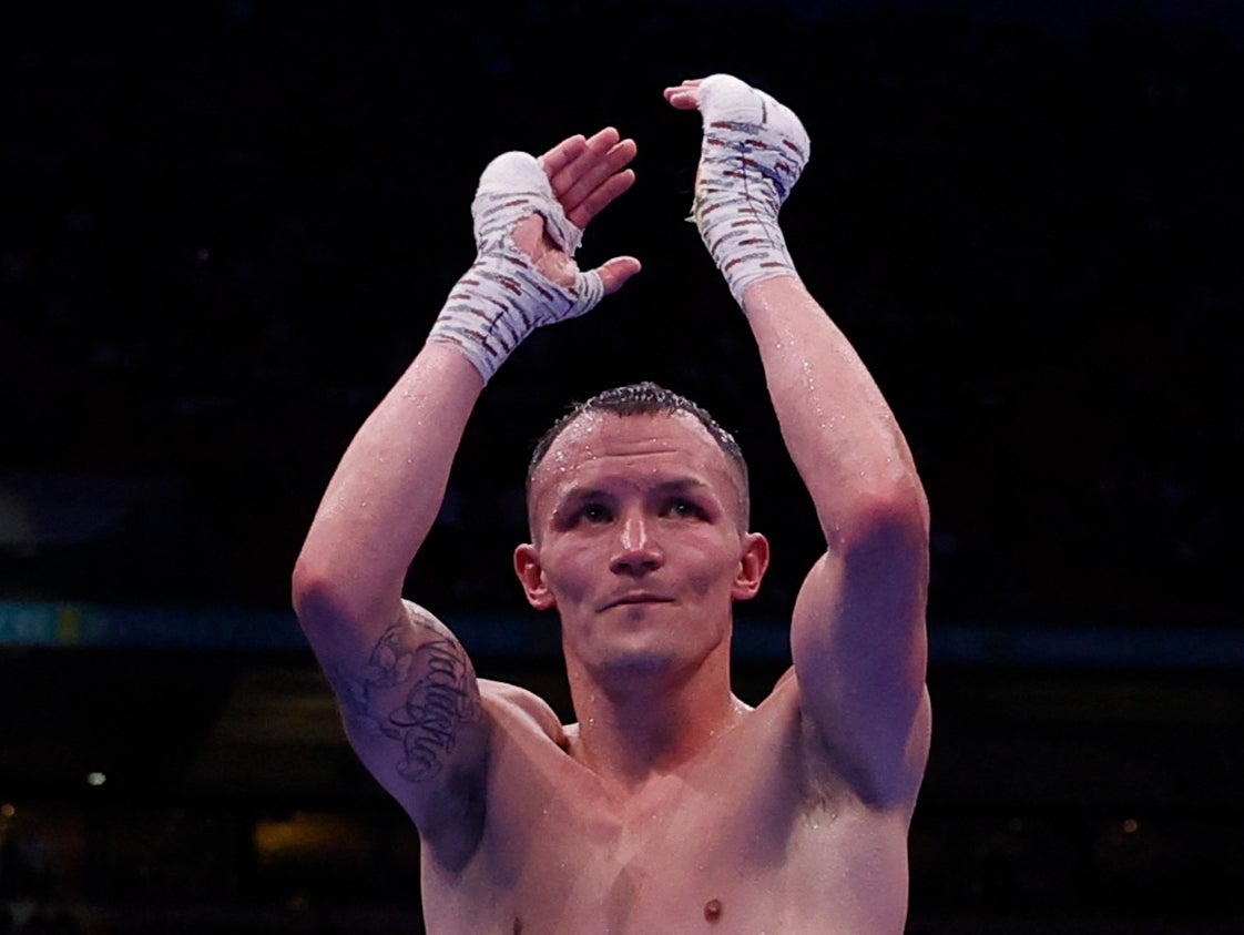 Josh Warrington looks dejected after losing his fight against Anthony Cacace