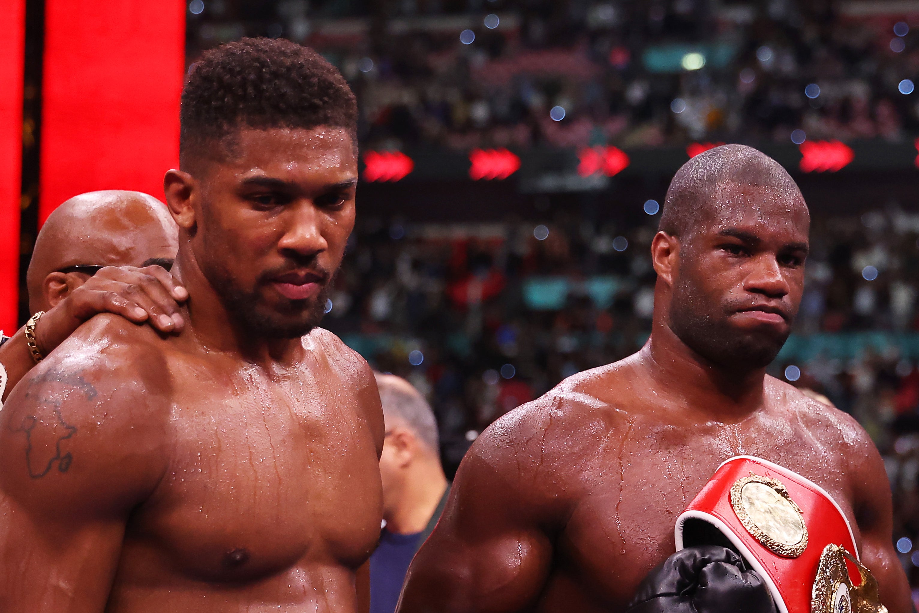 Daniel Dubois and Anthony Joshua react after the IBF World Heavyweight Title fight