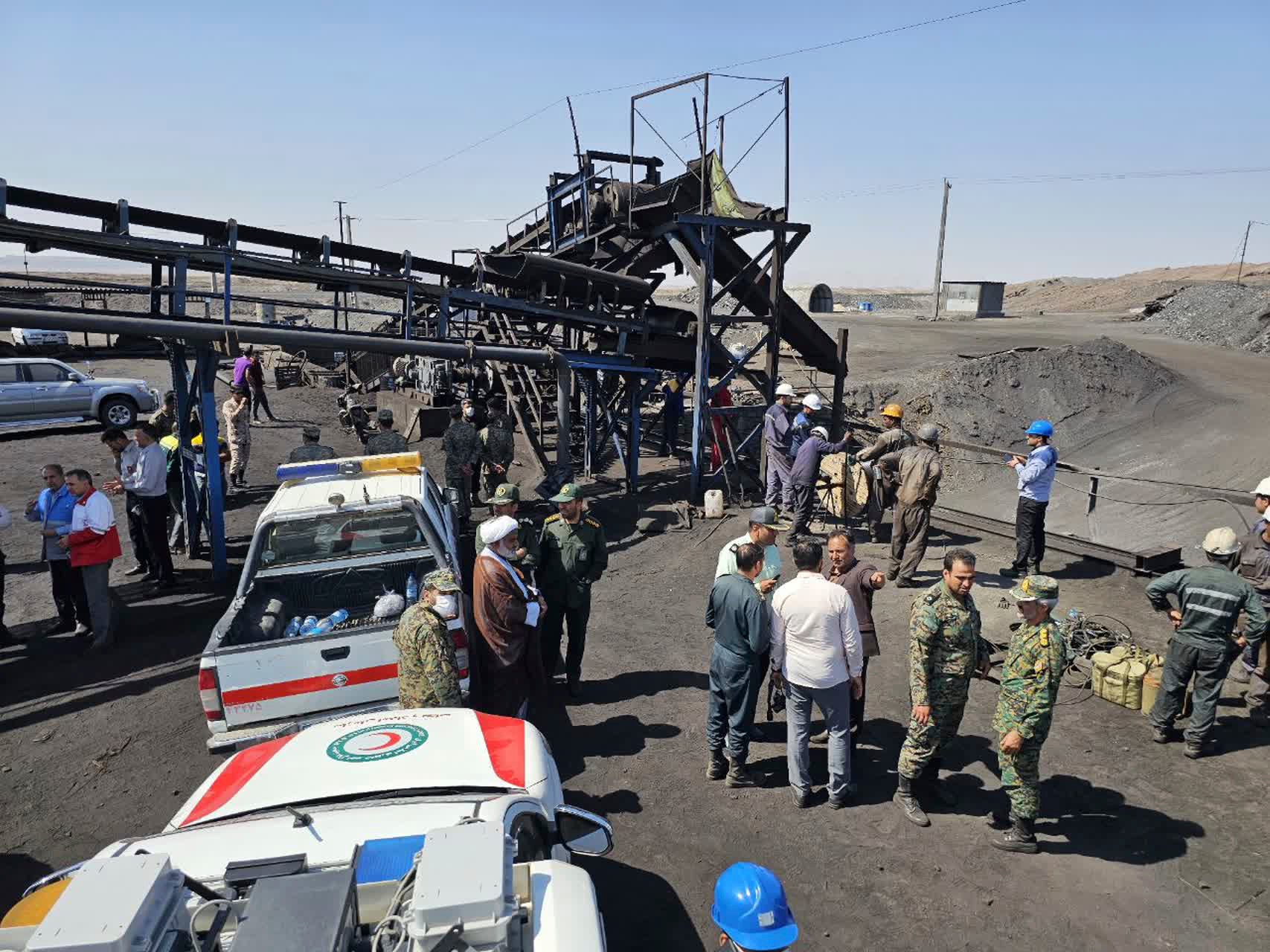 Photo released by Iranian Red Crescent Society shows rescue personnel and police at the site of the coal mine blast in Tabas, on 22 September 2024