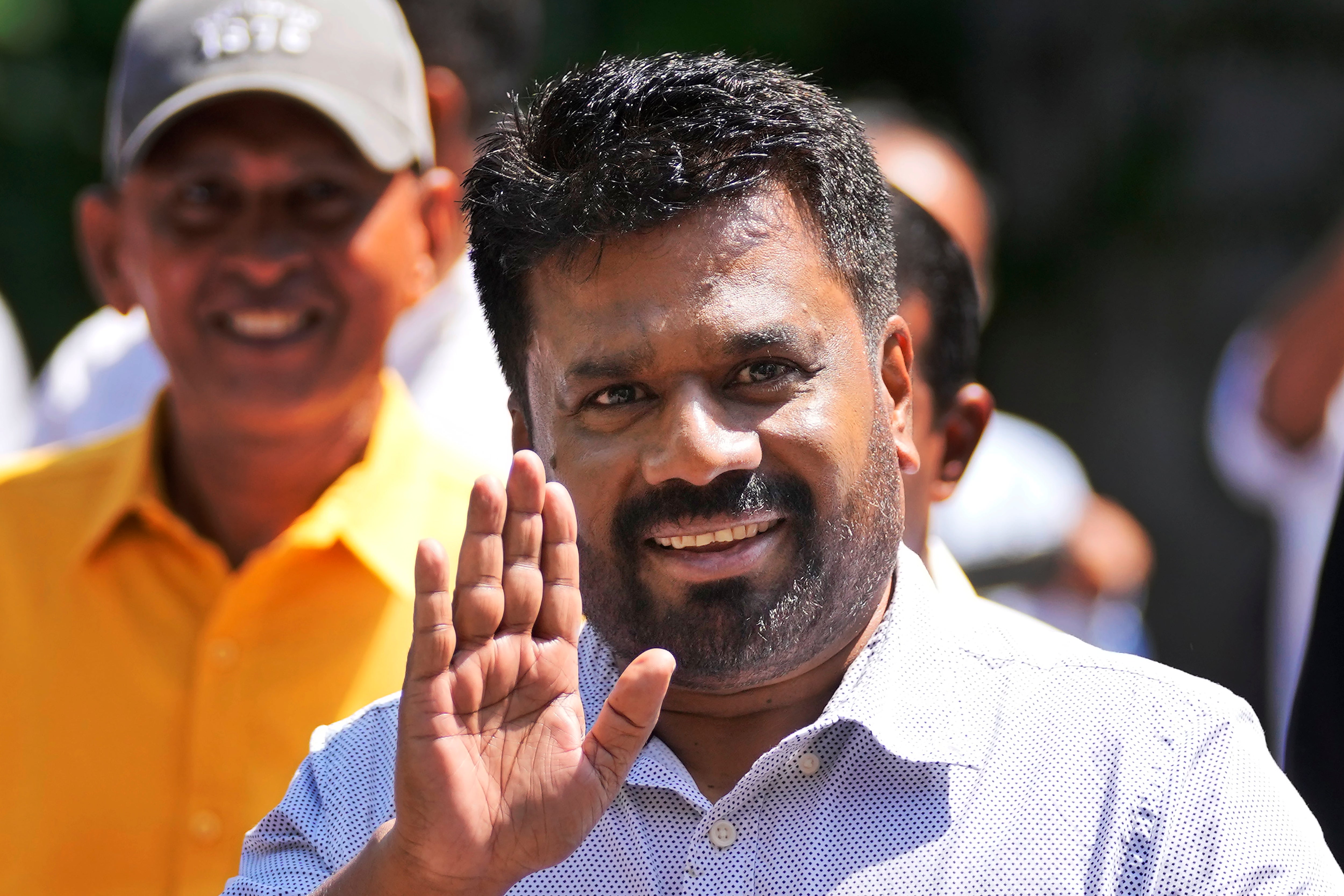 National People’s Power leader Anura Kumara Dissanayake arrives at a voting centre in Sri Lanka on 21 September