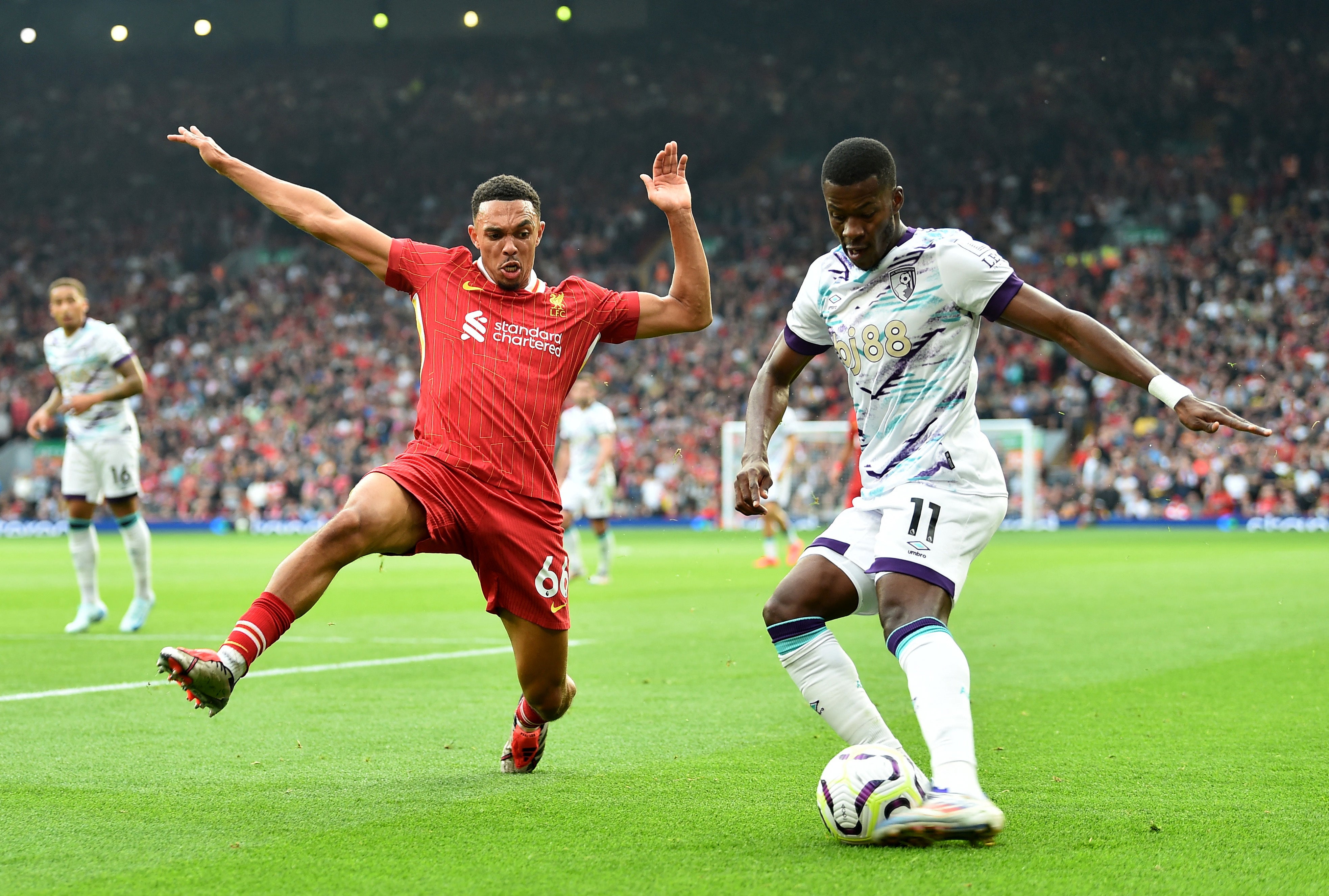 Trent Alexander-Arnold tries to shut down Bournemouth’s Dango Ouattara