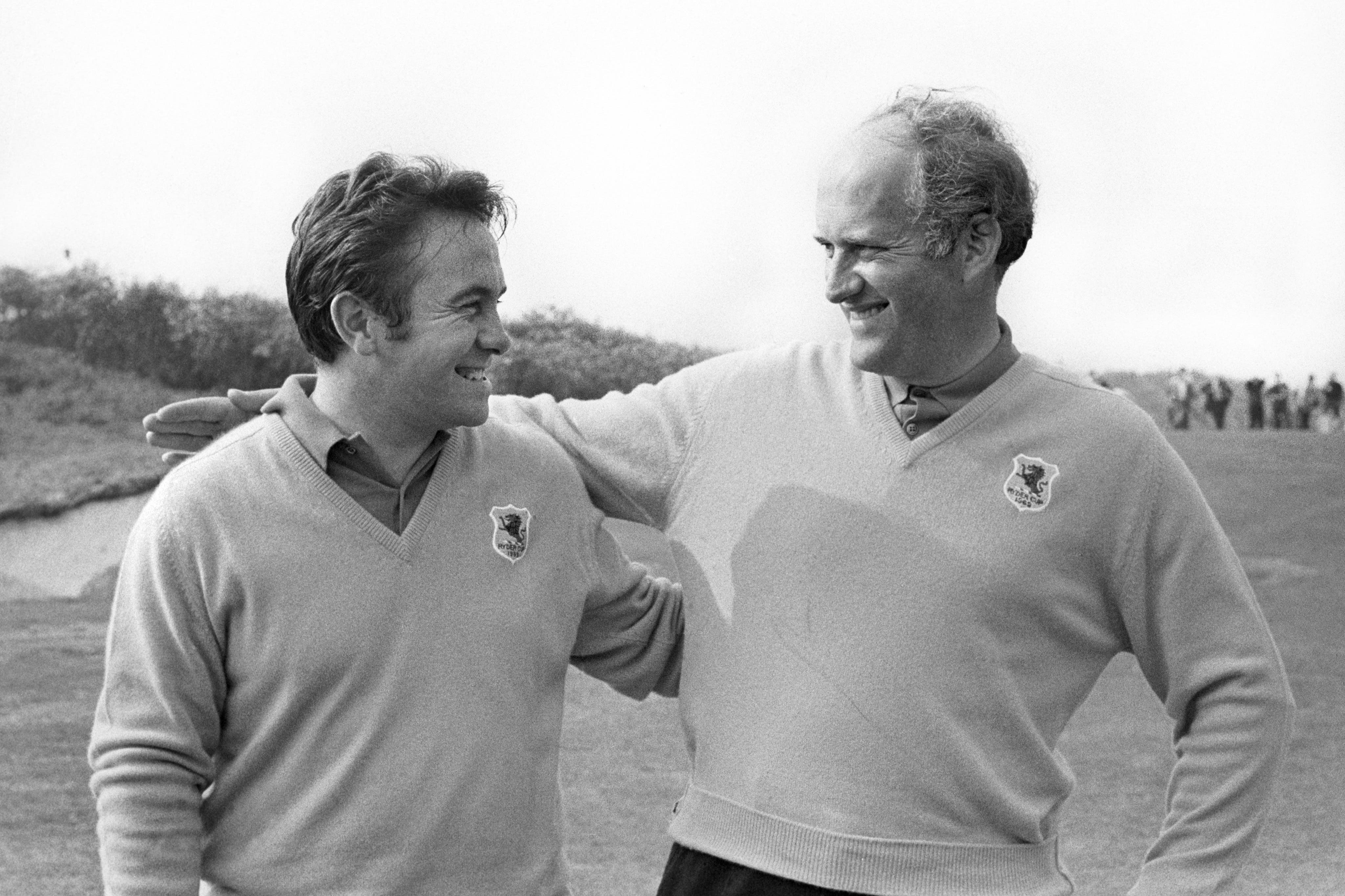 Brian Huggett, left, with Neil Coles at the 1969 Ryder Cup (PA)