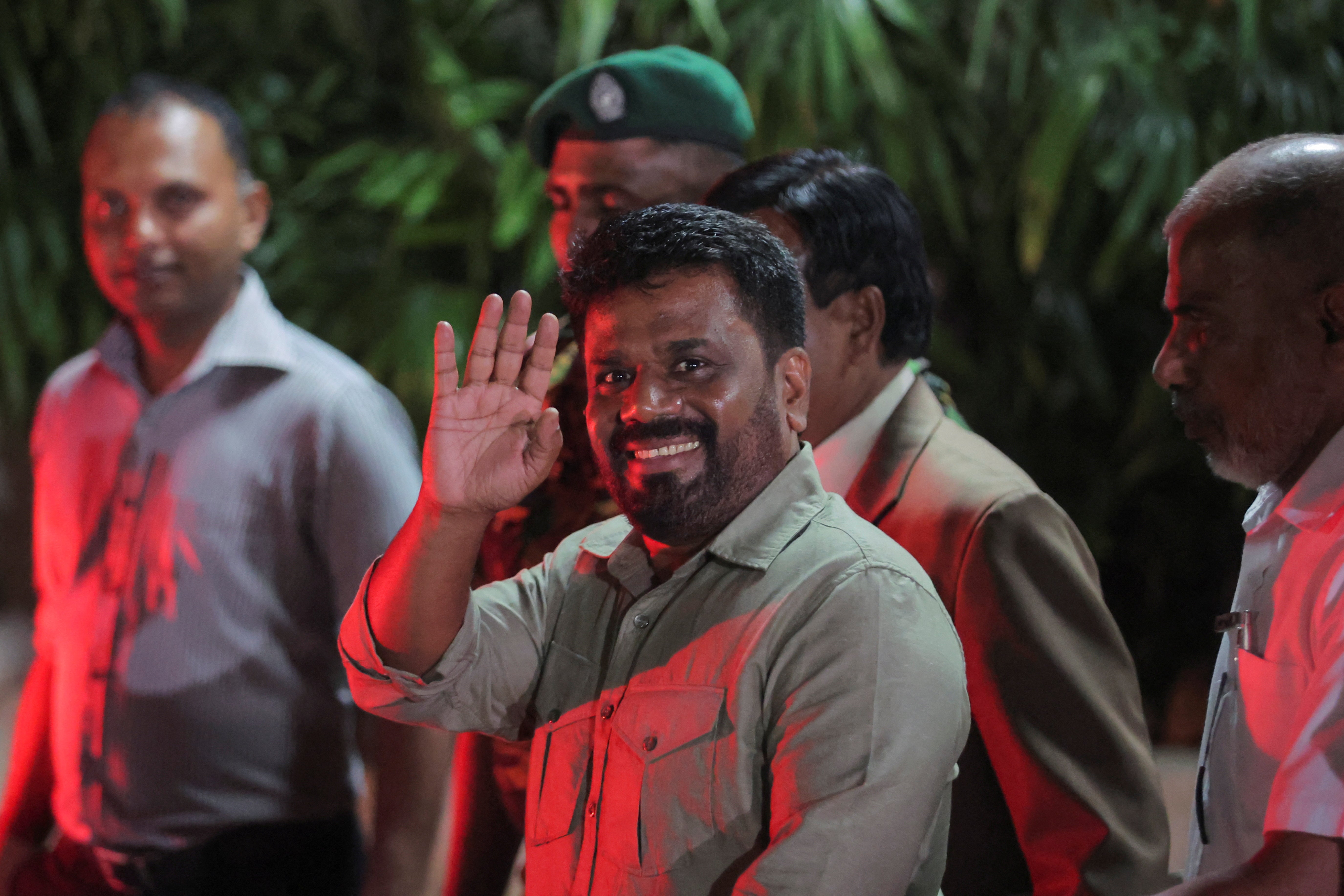 Anura Kumara Dissanayake, leader of the National People's Power (NPP) party, greets people as he leaves the election commission after claiming victory in the presidential election in Colombo, Sri Lanka, 22 September 2024