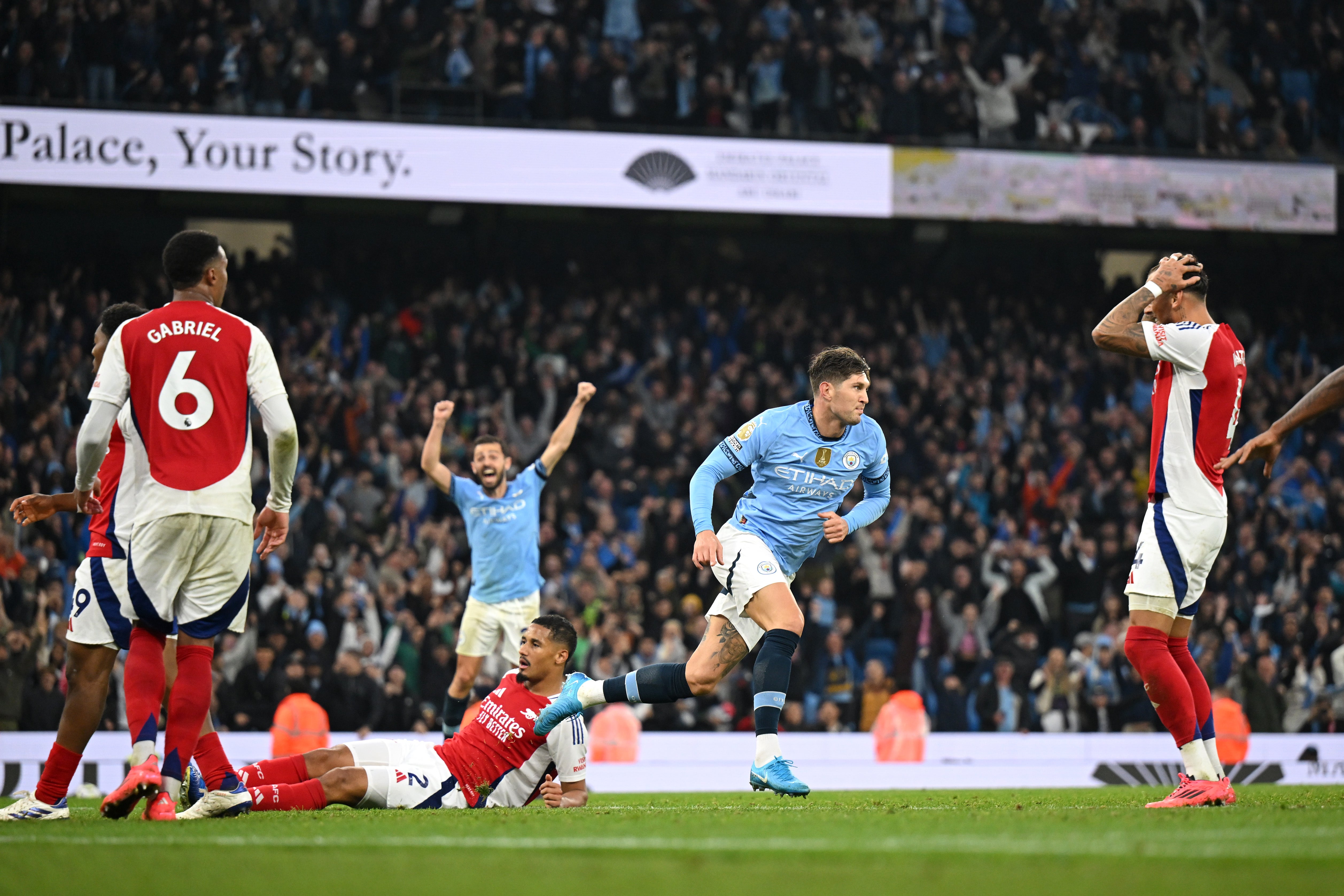 John Stones turns to celebrate after scoring Manchester City’s leveller