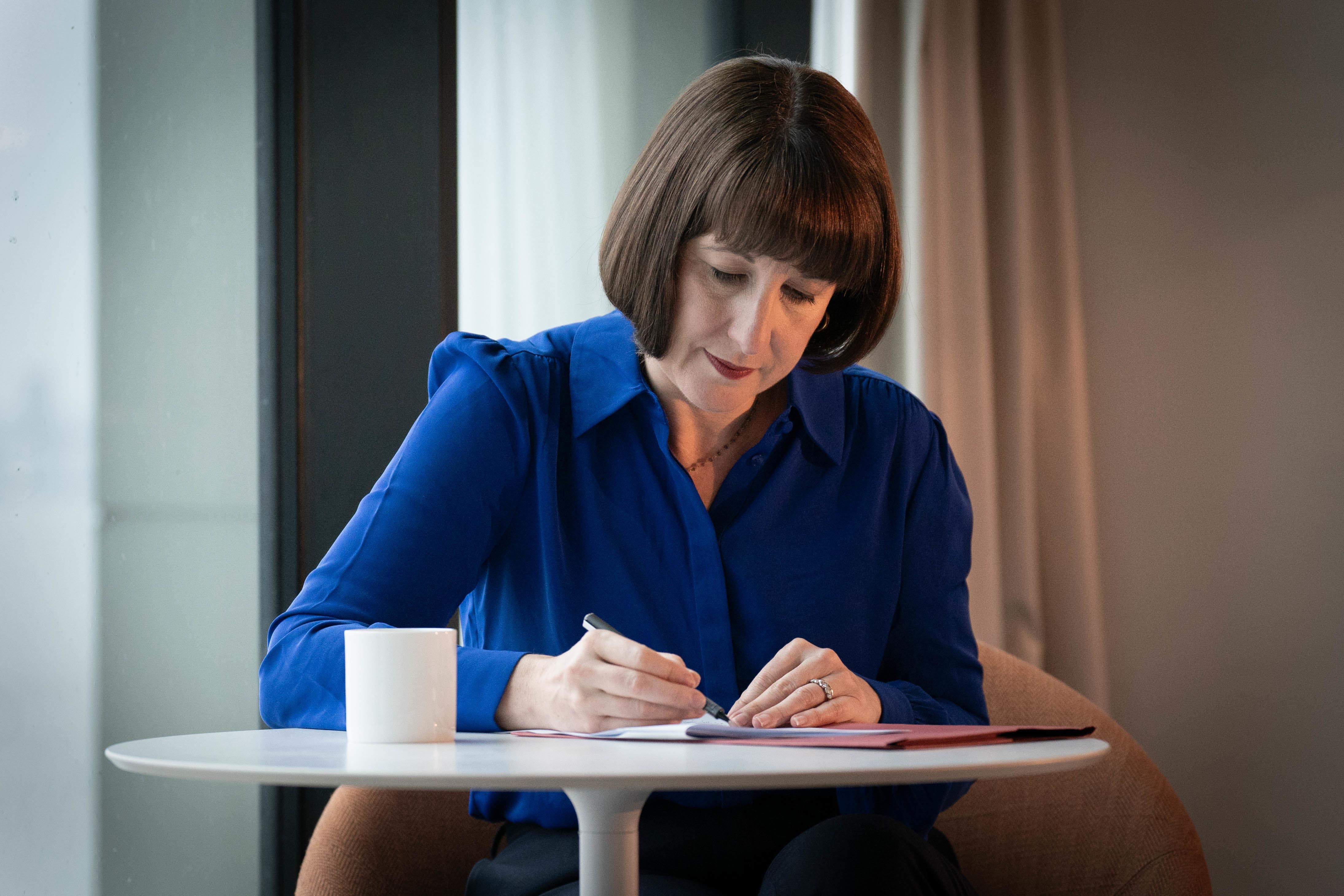 Chancellor Rachel Reeves prepares her Labour Party conference keynote speech in her hotel room in Liverpool (Stefan Rousseau/PA)