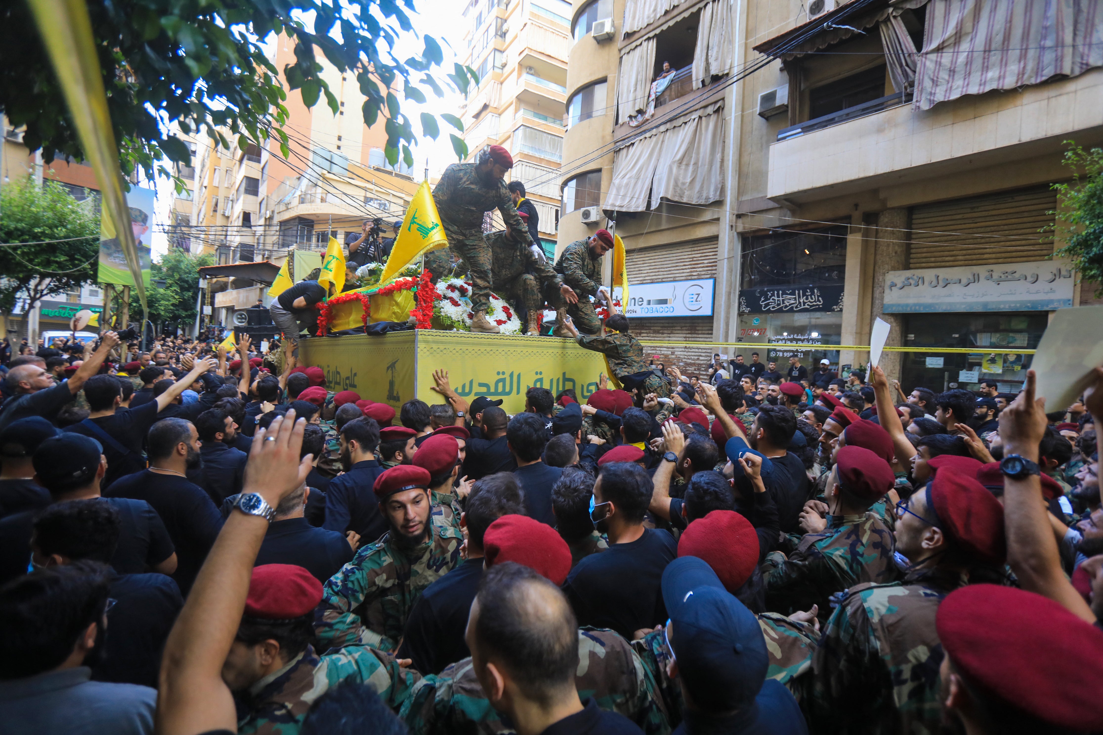 People take part in the funeral procession of Ibrahim Aqil, the head of Hezbollah’s elite Radwan Force, in Beirut’s southern suburbs on 22 September 2024