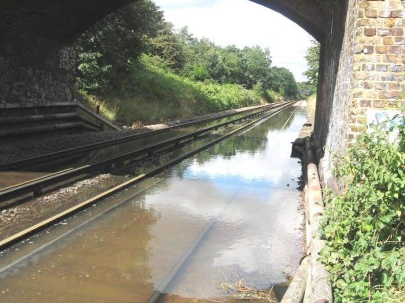 Water line: Flooding on the railway at Fulwell in Oxfordshire (file photo)