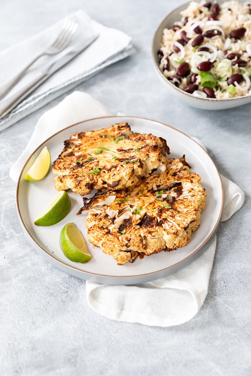 These hearty slices of cauliflower pair with protein-packed red kidney beans