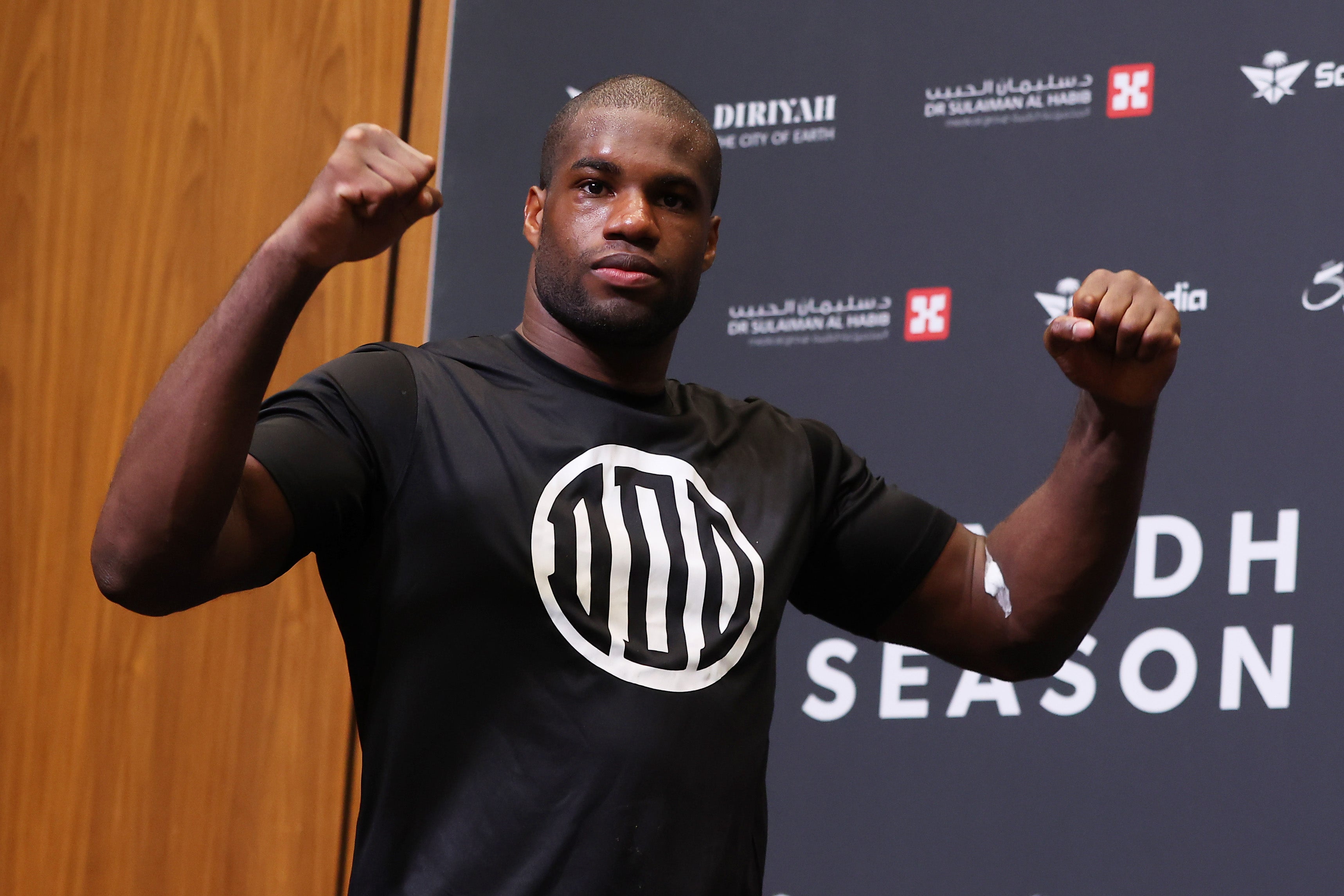 Dubois enters the press room during Saturday’s post-fight conference