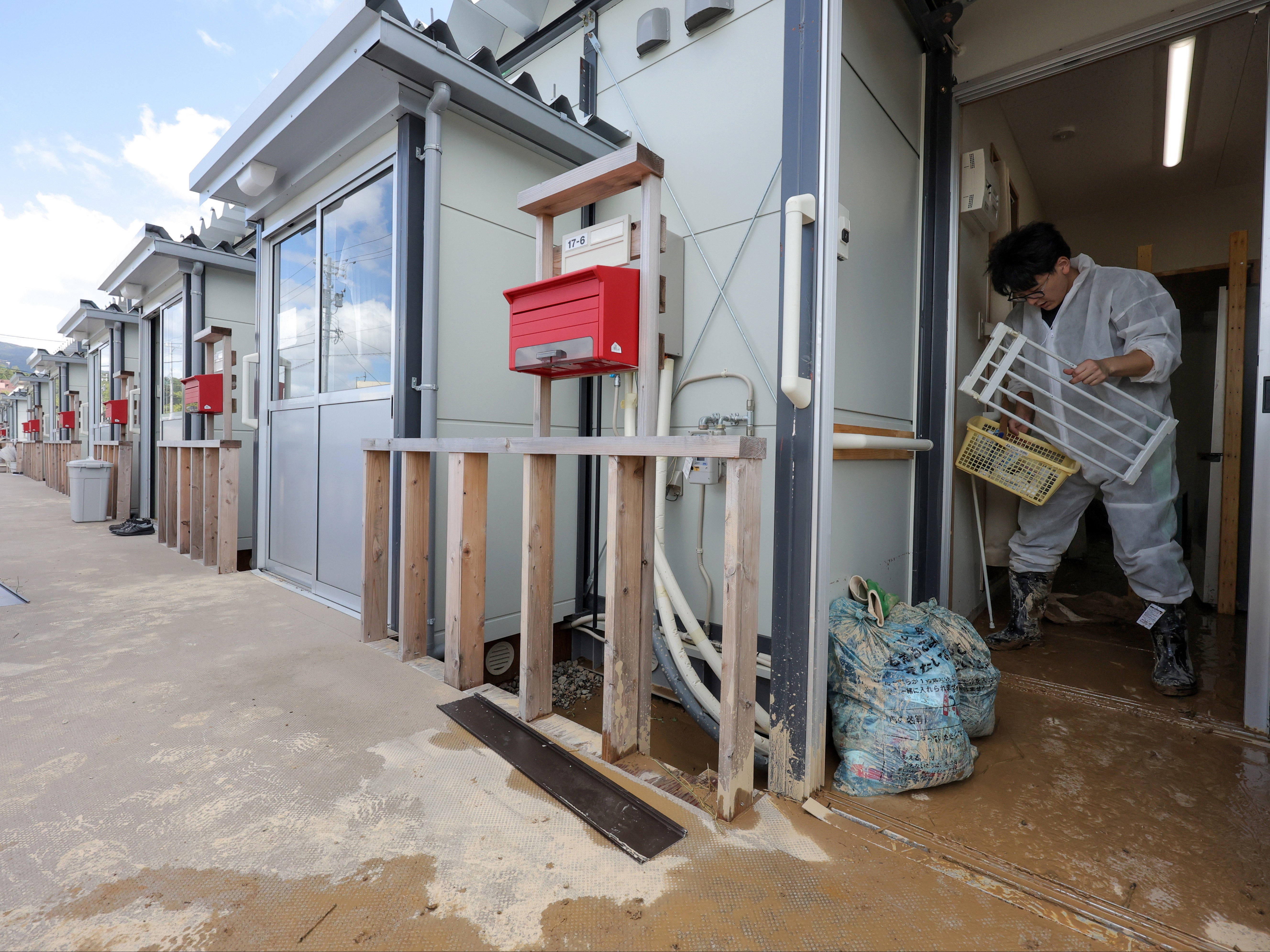 A temporary housing unit made for people who lost their homes after the New Year’s Day earthquake is flooded following torrential rain in Wajima, Japan