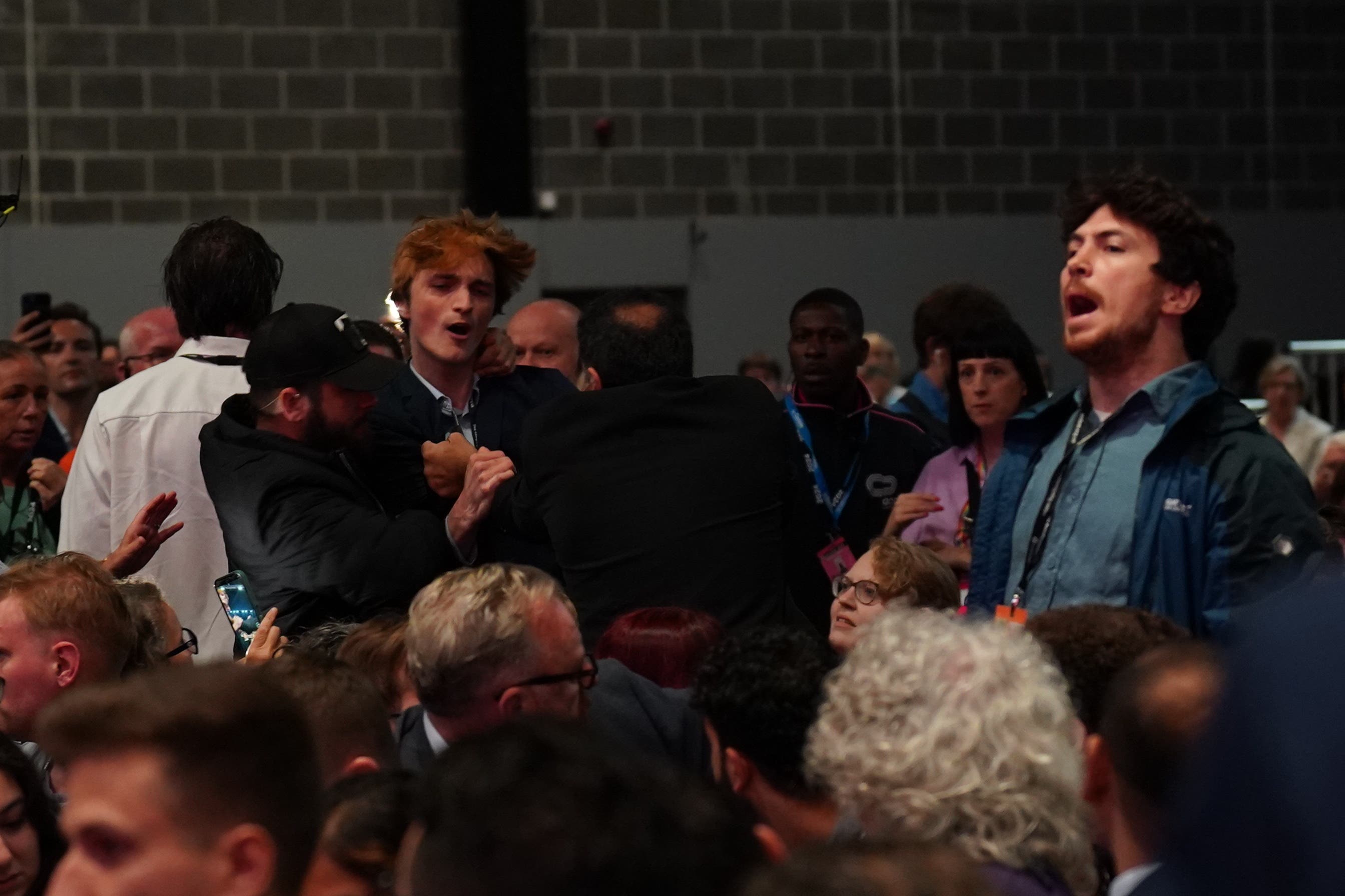 Protesters interrupted the Chancellor’s speech (Stefan Rousseau/PA)