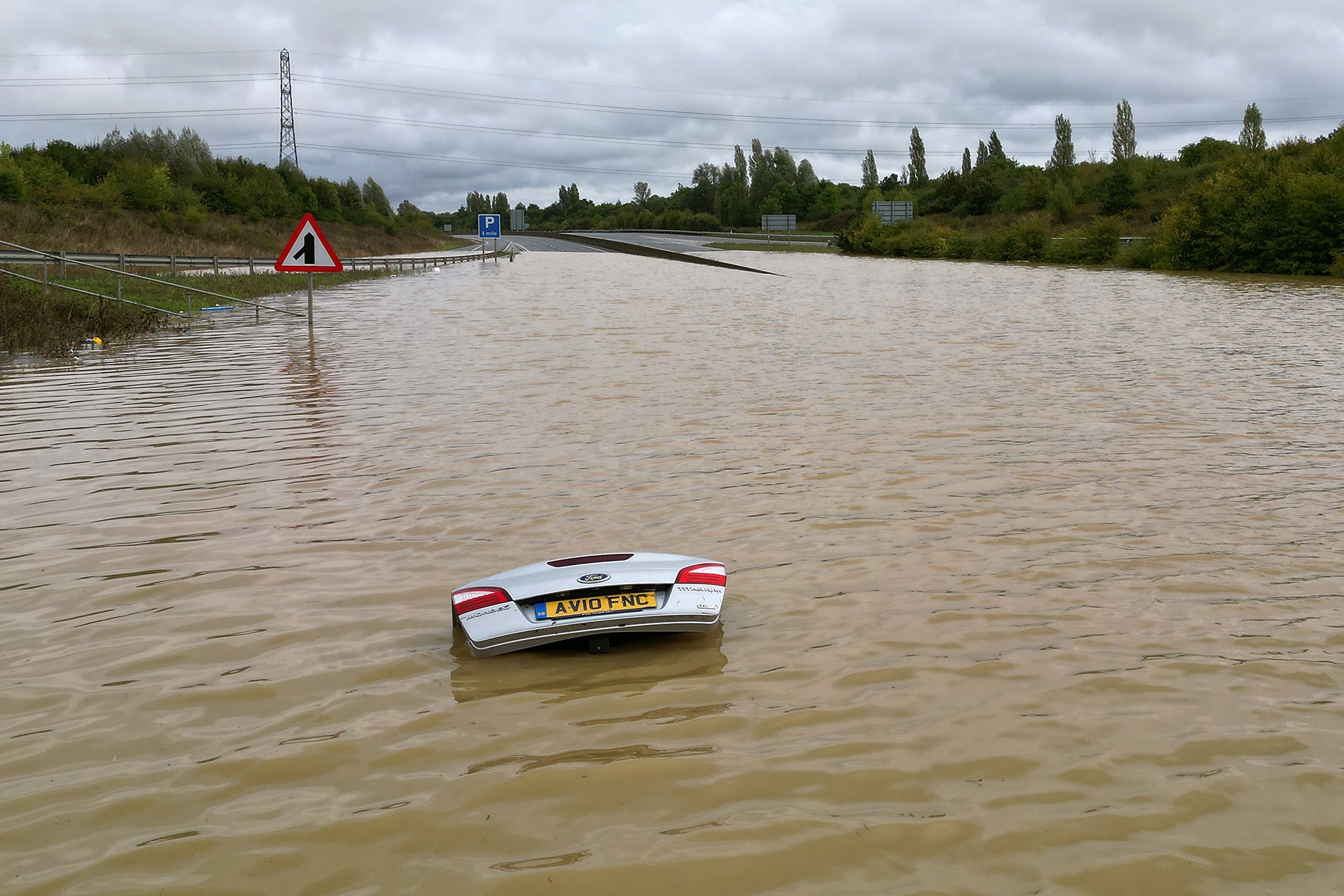 A submerged car in flooding in Bedfordshire on Monday