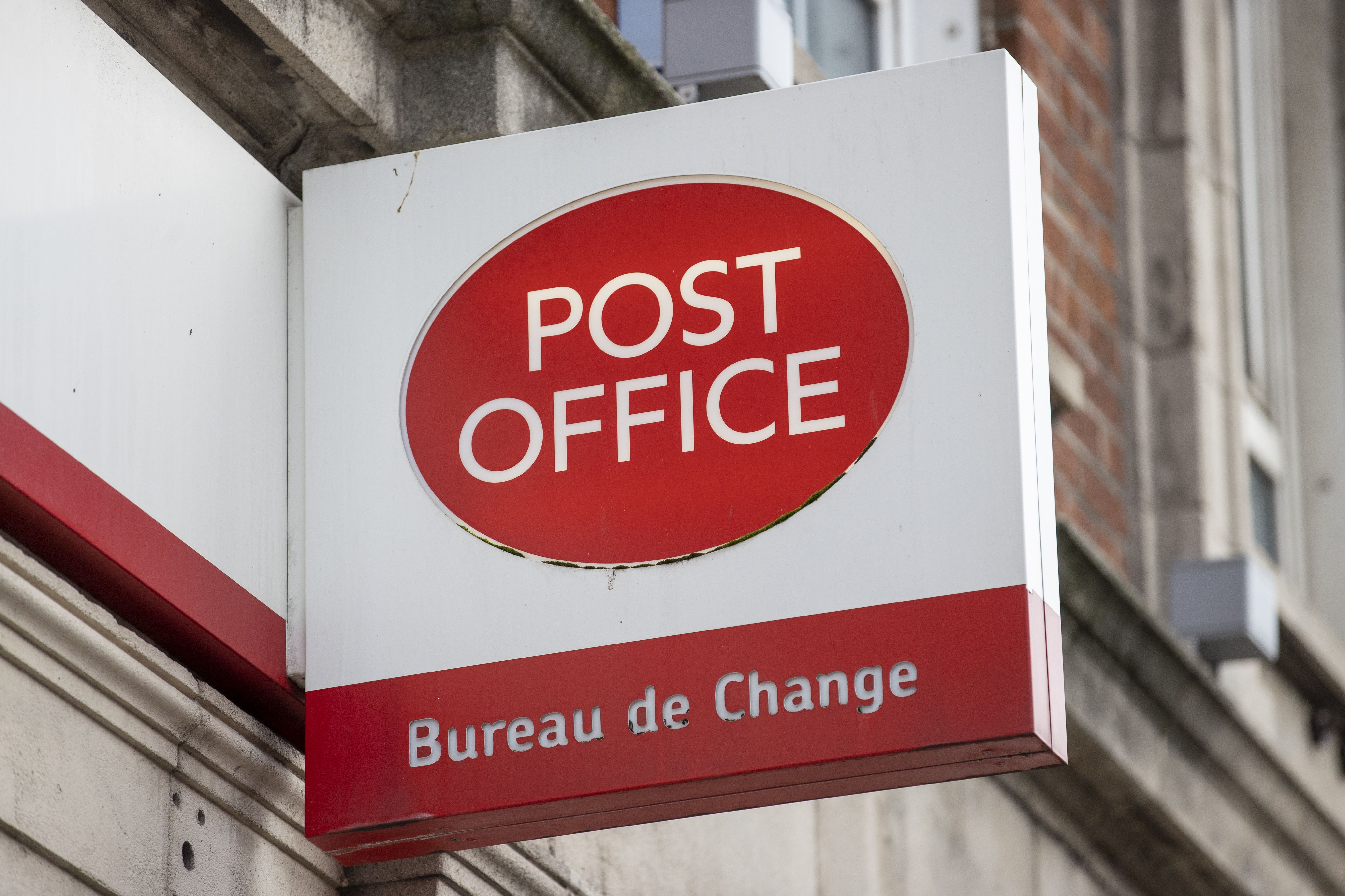 A sign for the Post Office (PA).