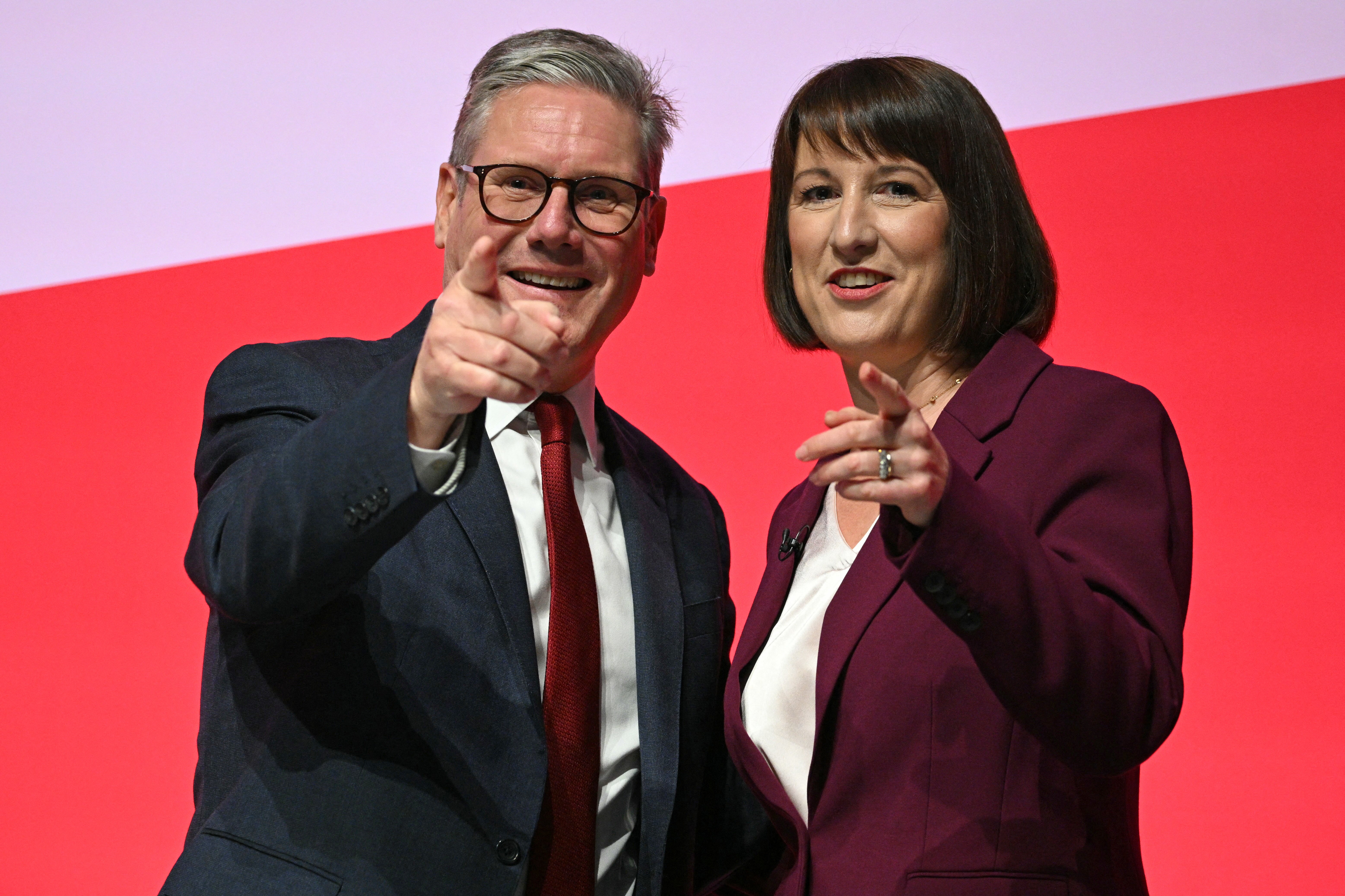 Britain’s Prime Minister Keir Starmer (L) and Britain’s Chancellor of the Exchequer Rachel Reeves (R)