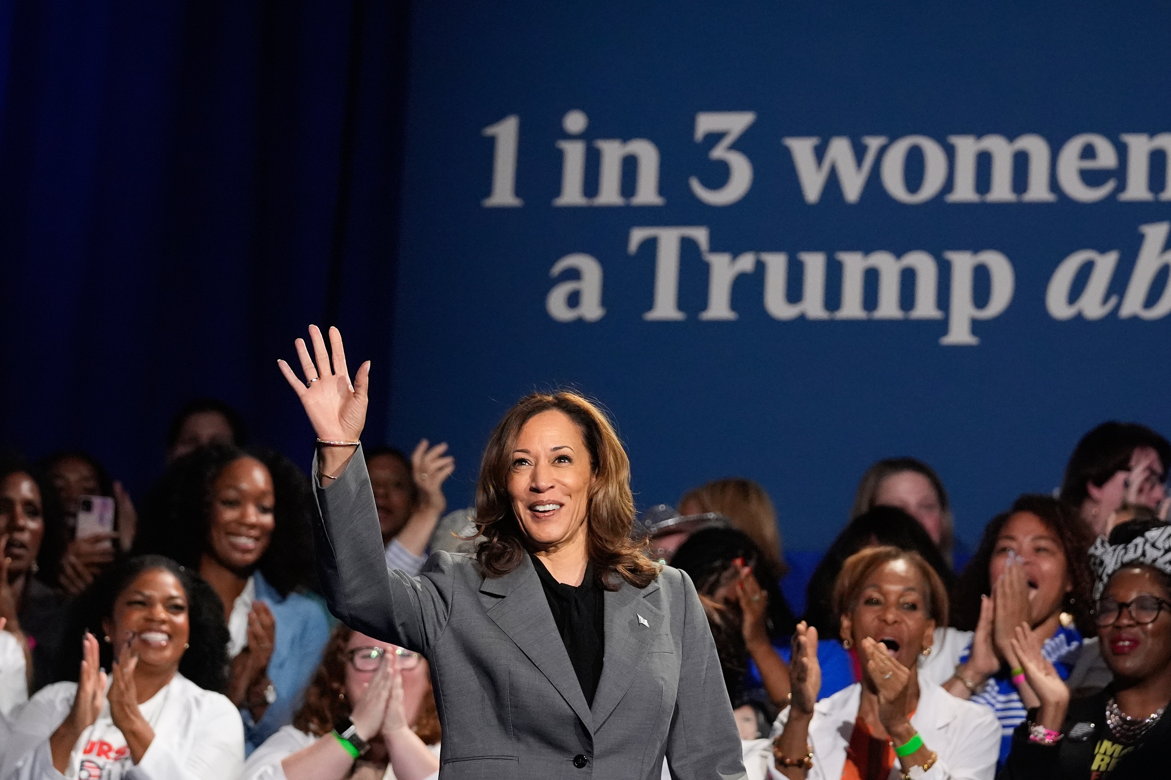 Democratic presidential nominee Vice President Kamala Harris waves to supporters at a campaign event on Friday, Sept. 20, 2024, in Atlanta.