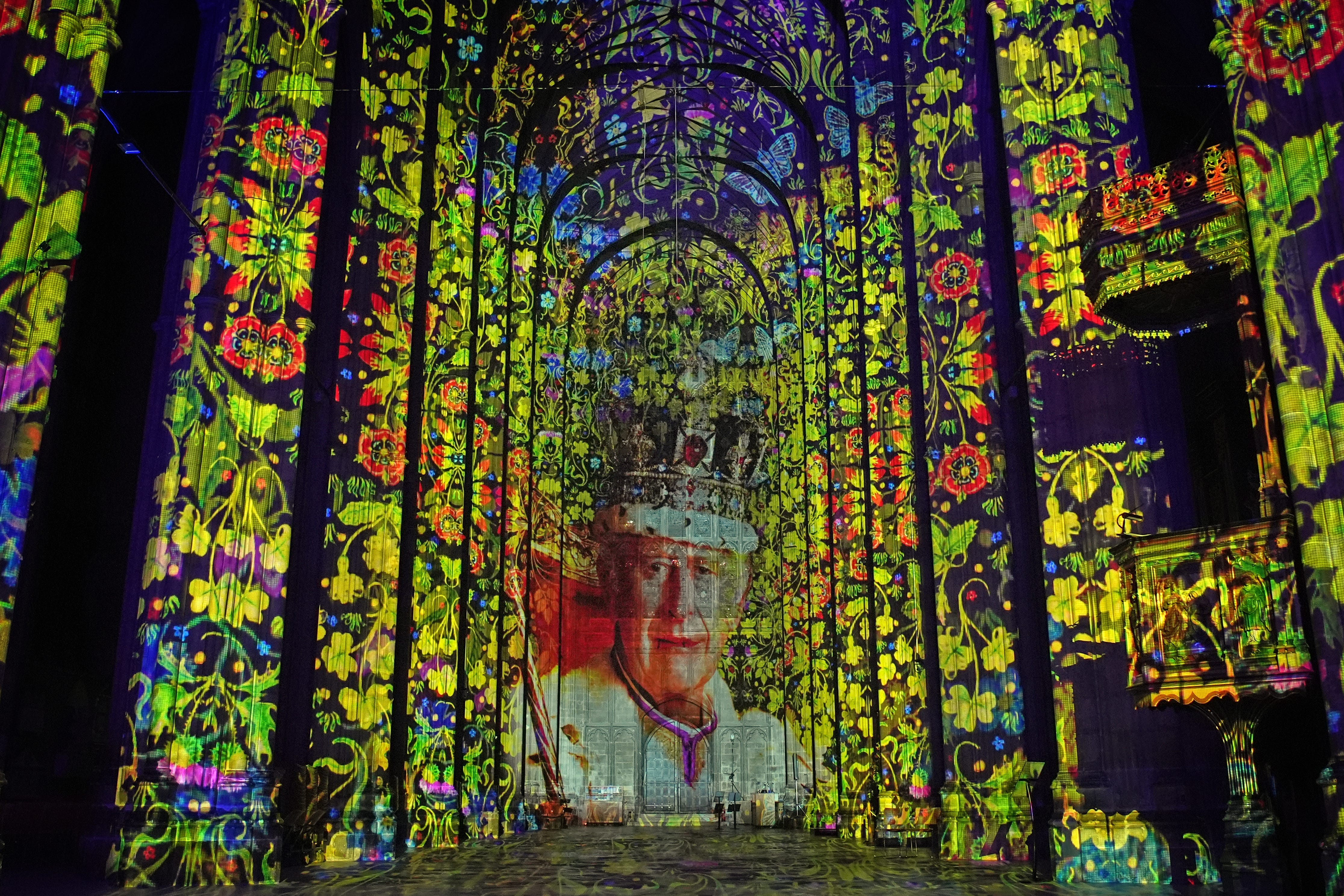 The King is among the royal faces in the display at the cathedral (Gareth Fuller/PA)