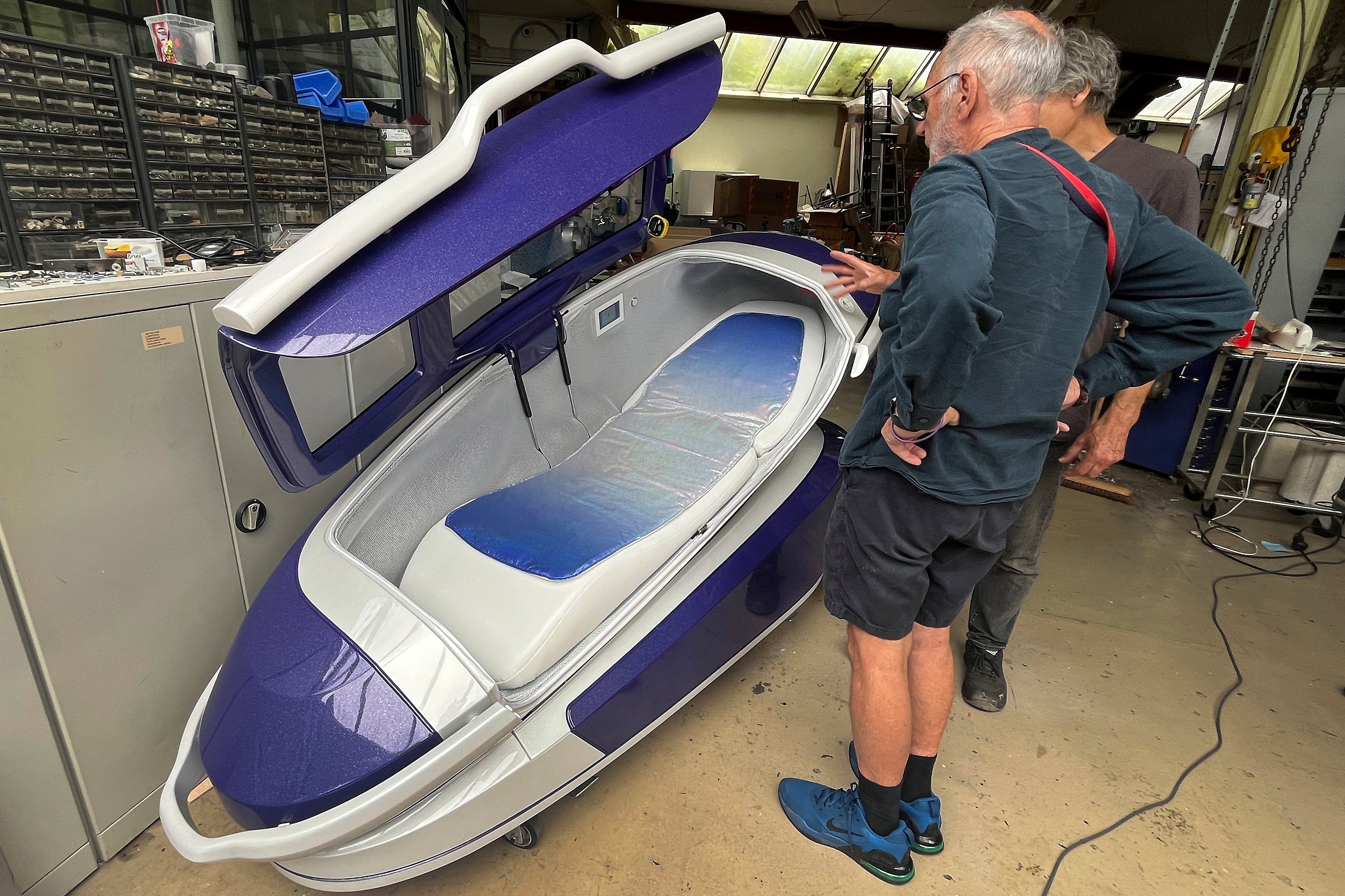 Australian inventor Dr Philip Nitschke stands next to his $1m suicide capsule