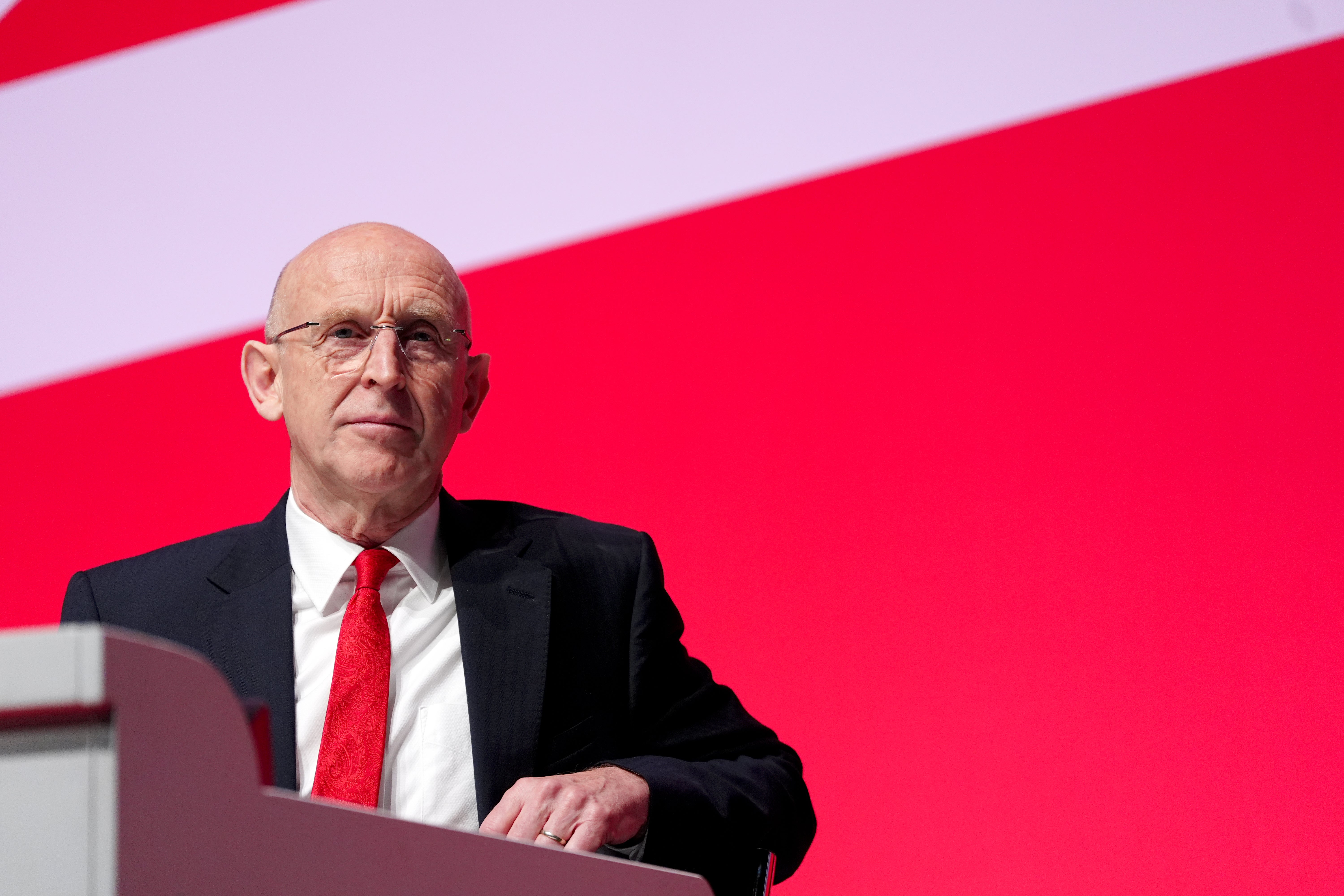 Defence secretary John Healey speaking at the Labour Party conference