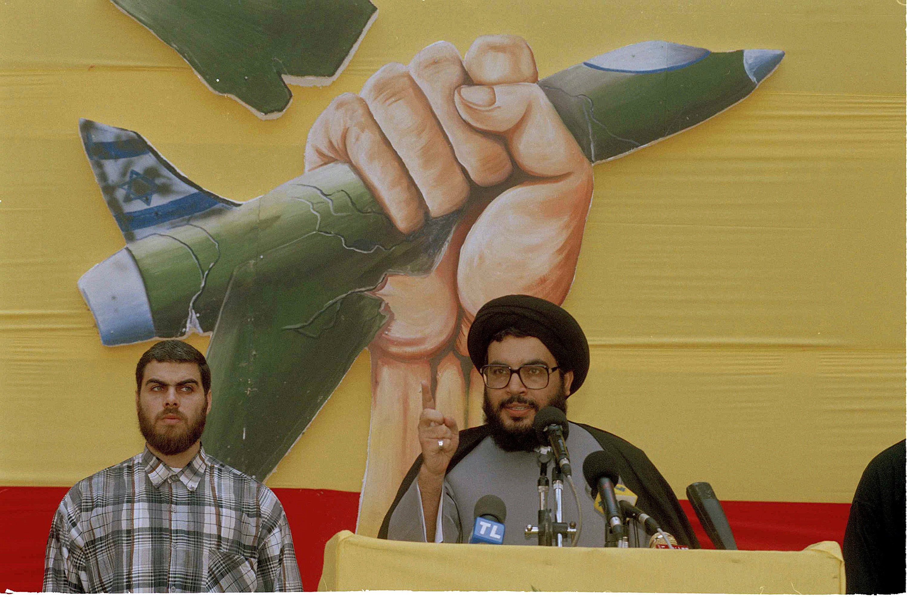 Hassan Nasrallah, leader of Hezbollah, speaks during a ceremony in Beirut on 24 July 1994, marking the first anniversary of the weeklong Israeli blitz on south Lebanon