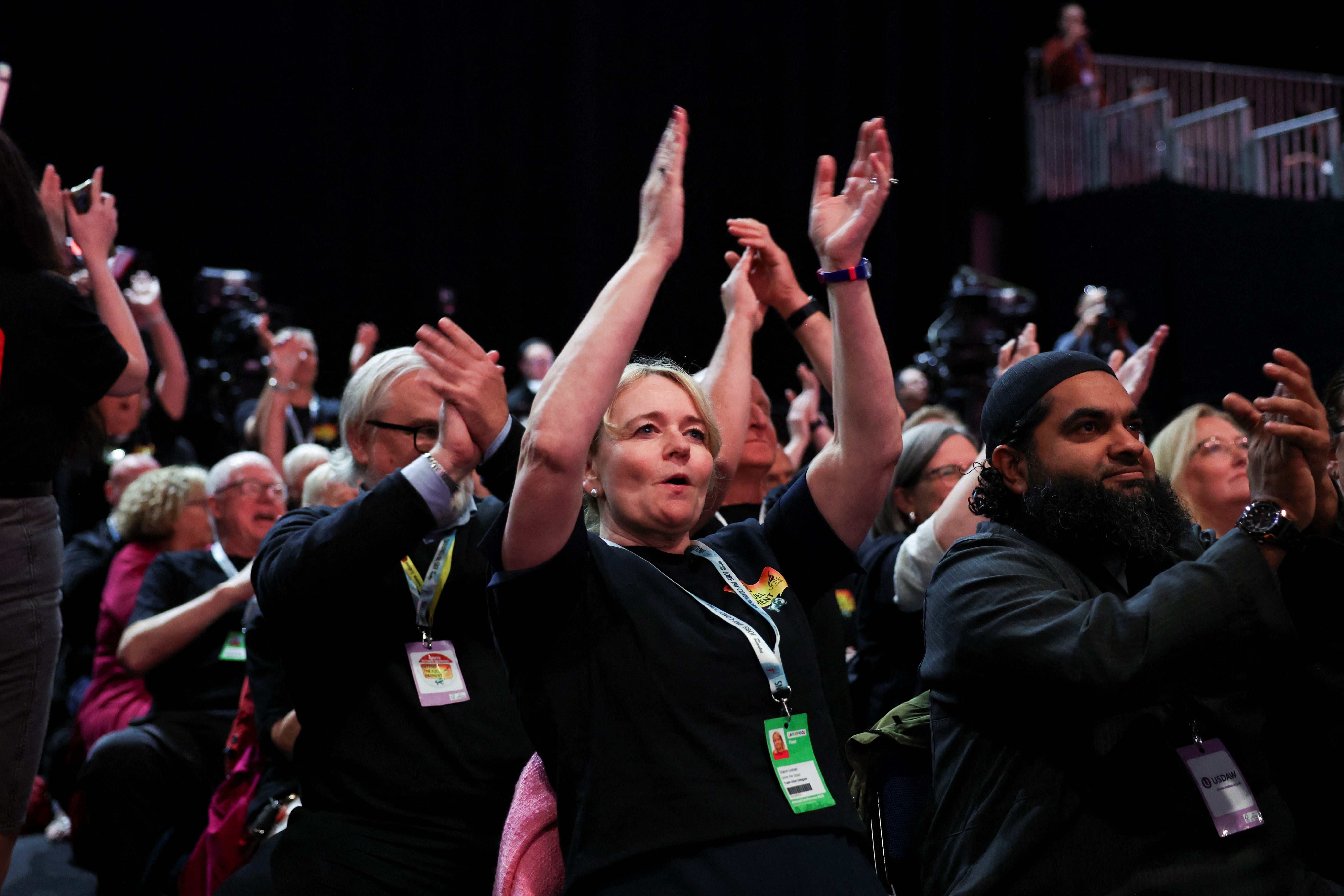 Sharon Graham, general secretary of Unite the Union, and other union members applaud at the Britain's Labour Party's annual conference in Liverpool